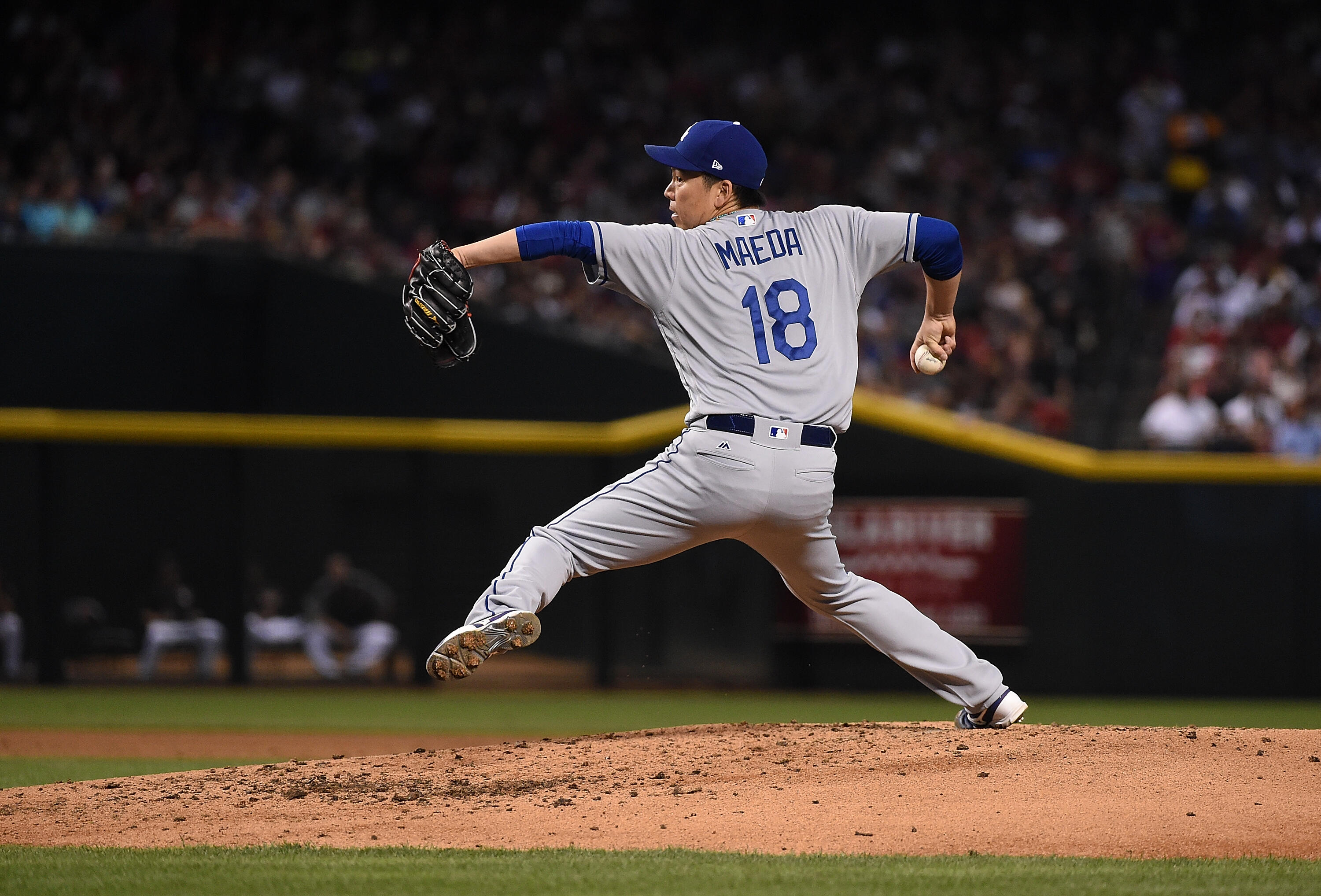 PHOENIX, AZ - APRIL 22:  Kenta Maeda #18 of the Los Angeles Dodgers delivers a second inning pitch against the Arizona Diamondbacks at Chase Field on April 22, 2017 in Phoenix, Arizona. Diamondbacks won 11-5.  (Photo by Norm Hall/Getty Images)