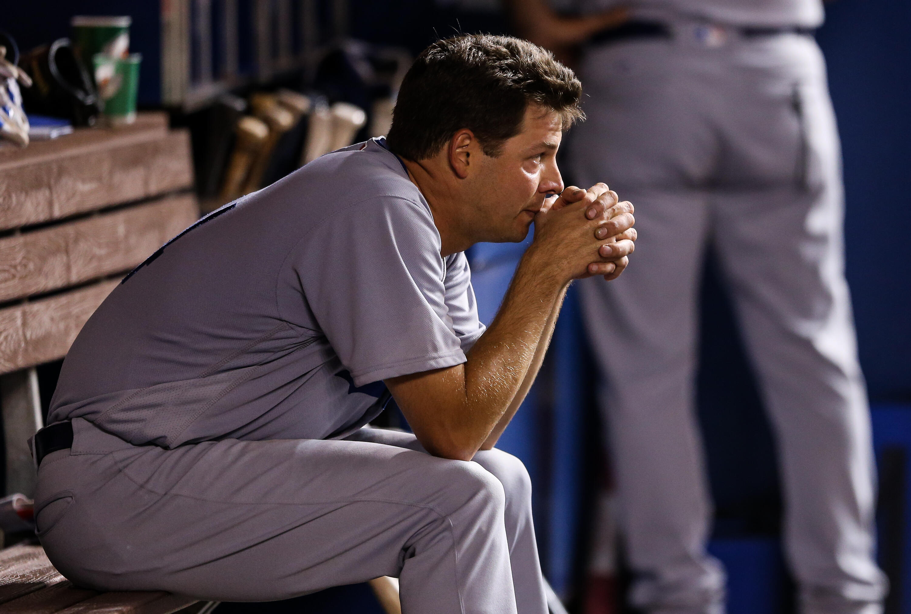 MIAMI, FL - SEPTEMBER 10: Rich Hill #44 of the Los Angeles Dodgers looks on from the dugout after being pulled during the eighth inning despite pitching seven perfect innings during the game against the Miami Marlins at Marlins Park on September 10, 2016 