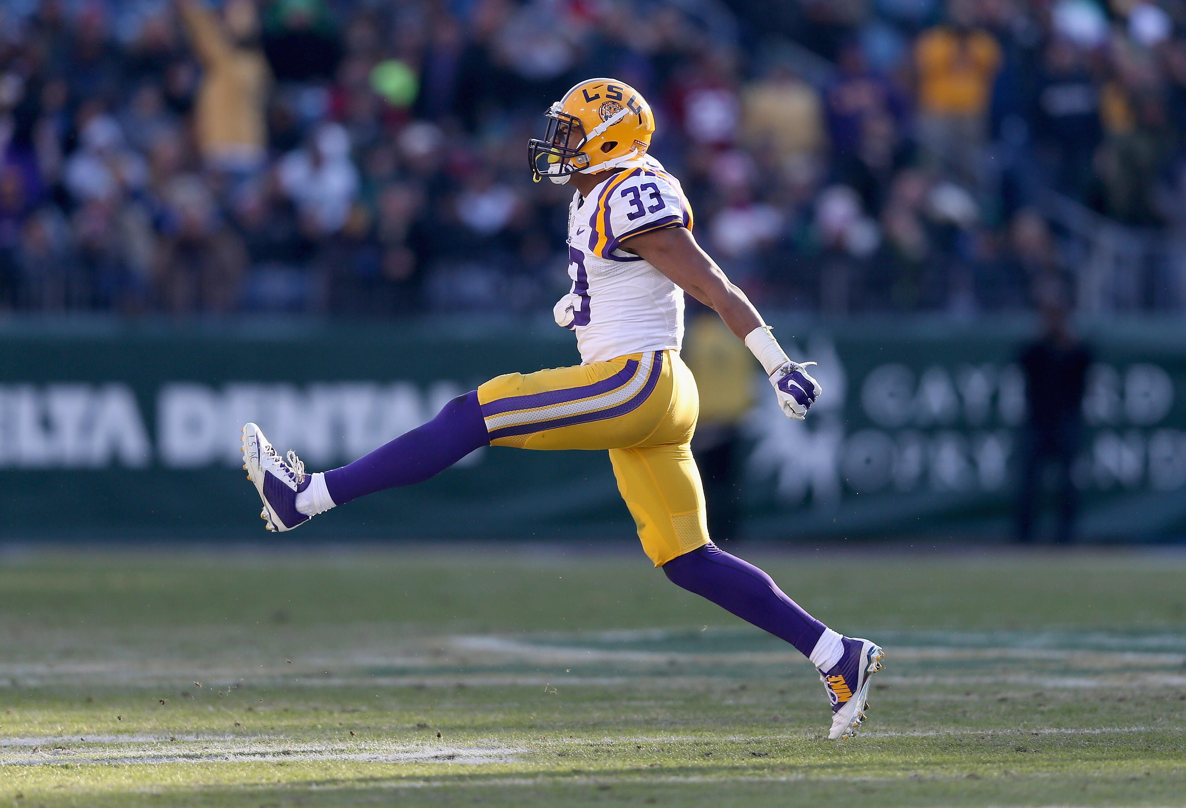 NASHVILLE, TN - DECEMBER 30:  Jamal Adams #33 of the LSU Tigers celebrates after a defensive stop of the Notre Dame Fighting Irish during the Franklin American Mortgage Music City Bowl at LP Field on December 30, 2014 in Nashville, Tennessee.  (Photo by A