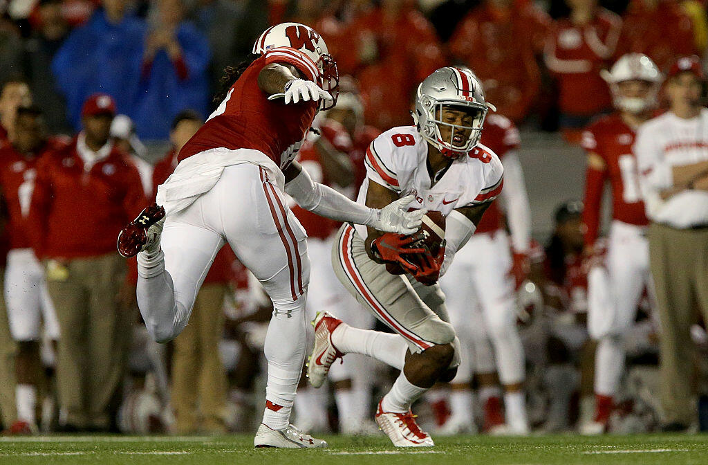 MADISON, WI - OCTOBER 15: Gareon Conley #8 of the Ohio State Buckeyes makes an interception in the third quarter against the Wisconsin Badgers at Camp Randall Stadium on October 15, 2016 in Madison, Wisconsin. (Photo by Dylan Buell/Getty Images)