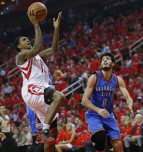 HOUSTON, TX - APRIL 25:  Lou Williams #12 of the Houston Rockets shoots as Alex Abrines #8 of the Oklahoma City Thunder looks on during Game Five of the Western Conference Quarterfinals game of the 2017 NBA Playoffs at Toyota Center on April 25, 2017 in H