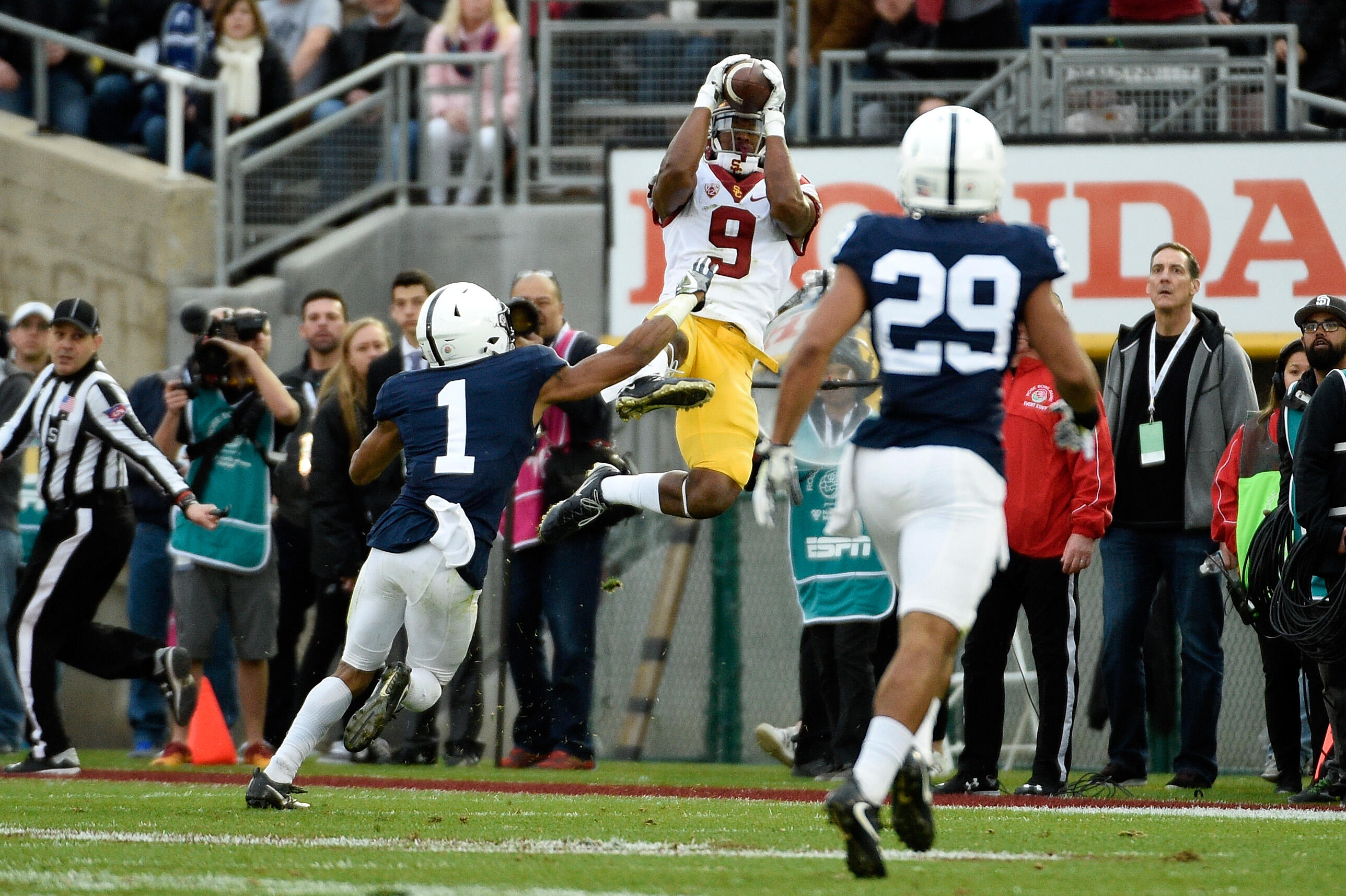 PASADENA, CA - JANUARY 02:  Wide receiver JuJu Smith-Schuster #9 of the USC Trojans makes a reception against cornerback Christian Campbell #1 of the Penn State Nittany Lions in the first half of the 2017 Rose Bowl Game presented by Northwestern Mutual at