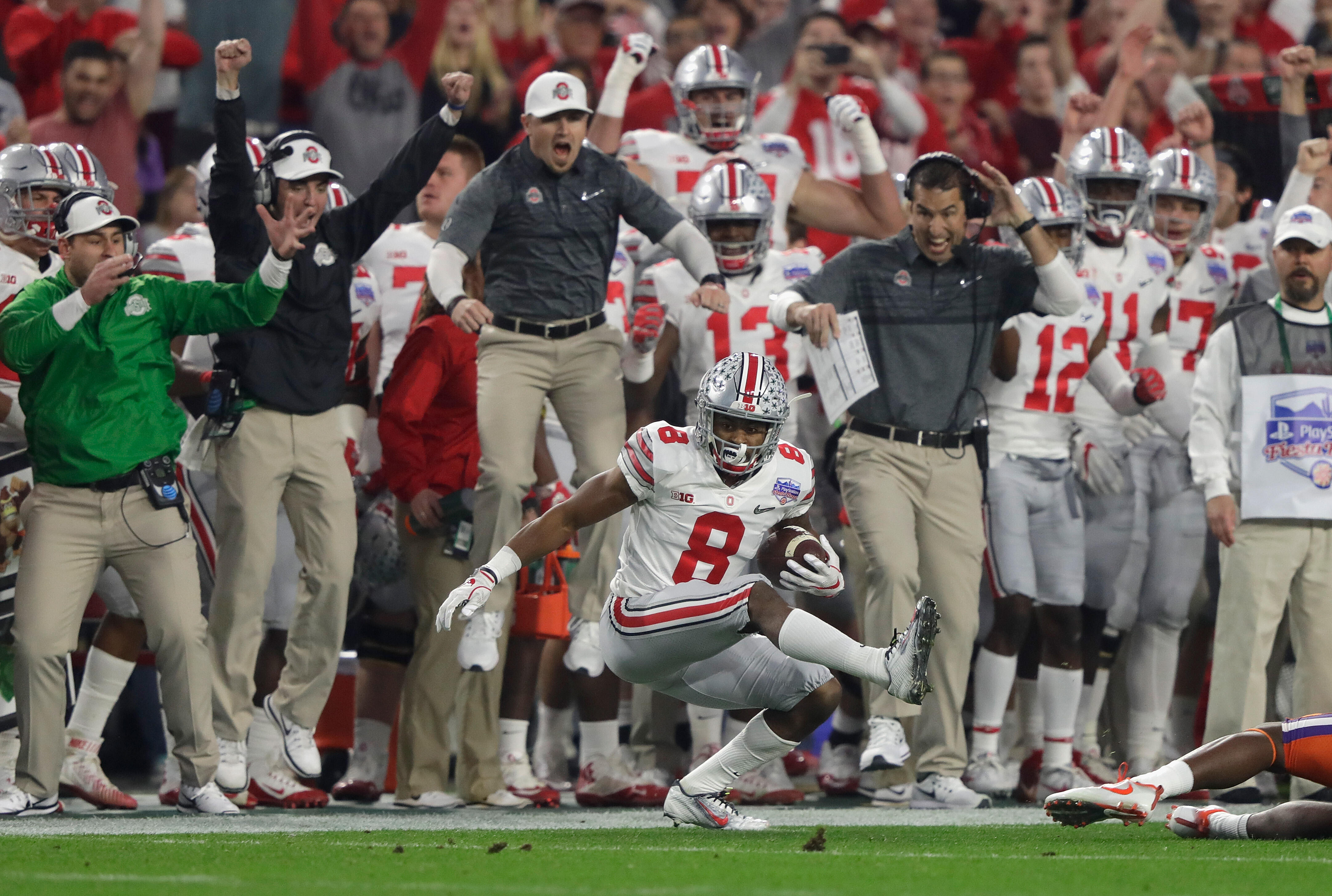 GLENDALE, AZ - DECEMBER 31:  Gareon Conley #8 of the Ohio State Buckeyes intercepts a pass intended for Mike Williams #7 of the Clemson Tigers (not pictured) during the first half of the 2016 PlayStation Fiesta Bowl at University of Phoenix Stadium on Dec