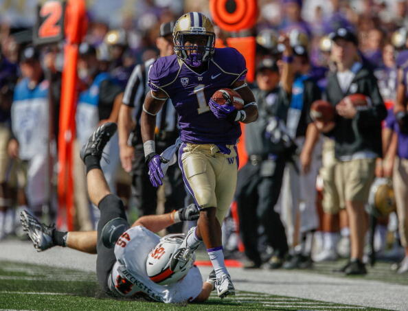 SEATTLE, WA - SEPTEMBER 21:  Wide receiver John Ross #1 of the Washington Huskies rushes for a 57 yard touchdown in the second half against the Idaho State Bengals on September 21, 2013 at Husky Stadium in Seattle, Washington. The Huskies the Bengals 56-0