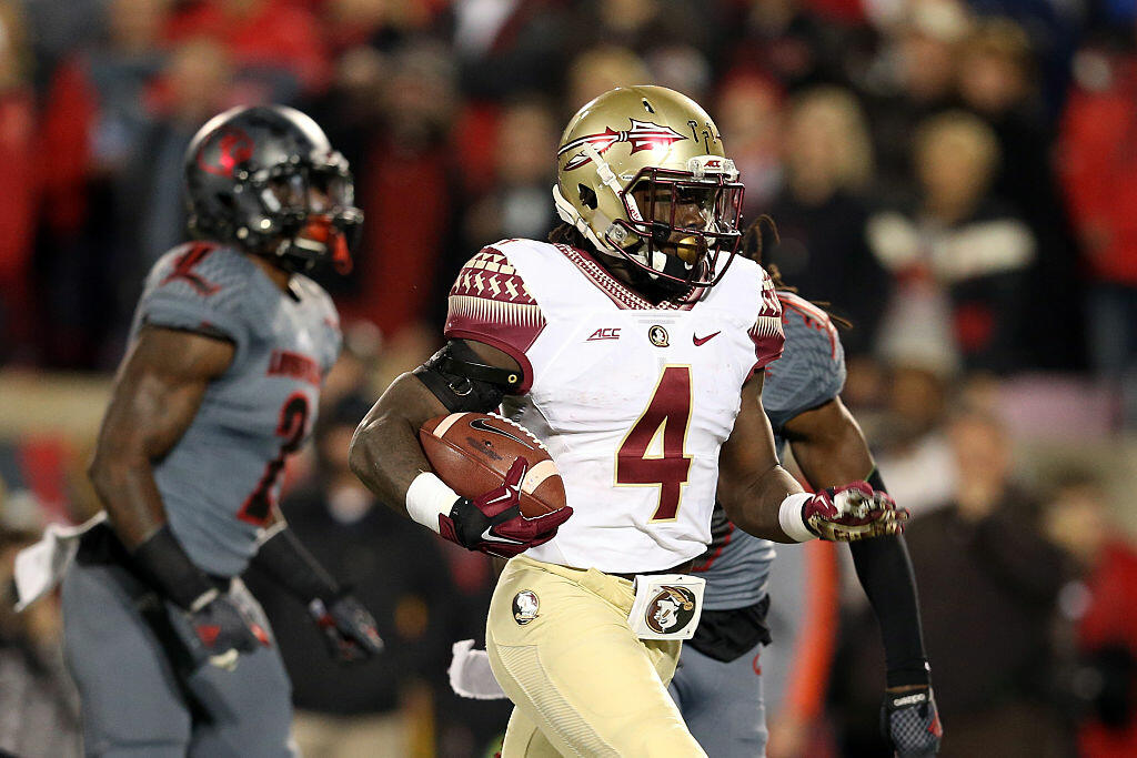 LOUISVILLE, KY - OCTOBER 30:  Dalvin Cook #4 of the Florida State Seminoles scores a 40 yard touchdown in the third quarter against the Louisville Cardinals during their game at Papa John's Cardinal Stadium on October 30, 2014 in Louisville, Kentucky.  (P