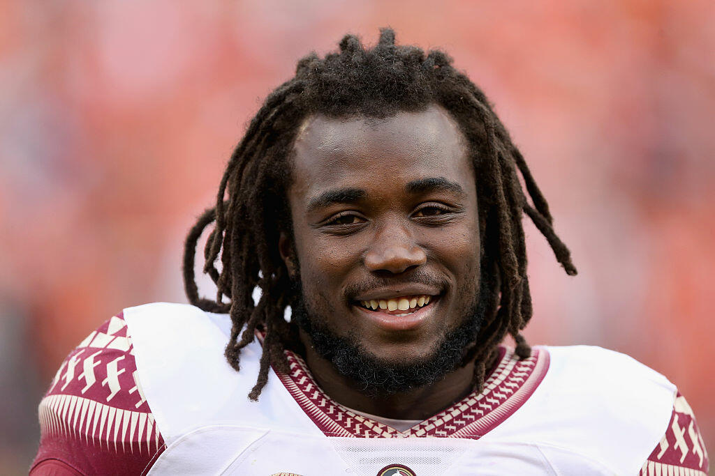 CLEMSON, SC - NOVEMBER 07:  Dalvin Cook #4 of the Florida State Seminoles watches on before their game against the Clemson Tigers at Memorial Stadium on November 7, 2015 in Clemson, South Carolina.  (Photo by Streeter Lecka/Getty Images)