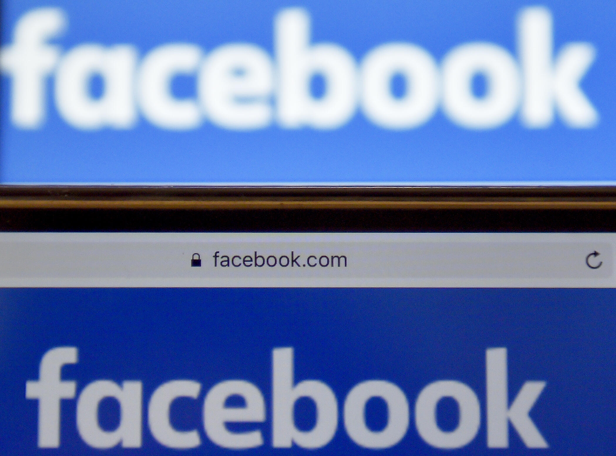 A picture taken on December 28, 2016 in Vertou, western France, shows logos of US online social media and social networking service Facebook. / AFP PHOTO / LOIC VENANCE        (Photo credit should read LOIC VENANCE/AFP/Getty Images)