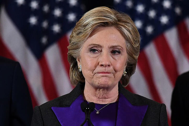 TOPSHOT - US Democratic presidential candidate Hillary Clinton makes a concession speech after being defeated by Republican president-elect Donald Trump in New York on November 9, 2016. / AFP / JEWEL SAMAD        (Photo credit should read JEWEL SAMAD/AFP/