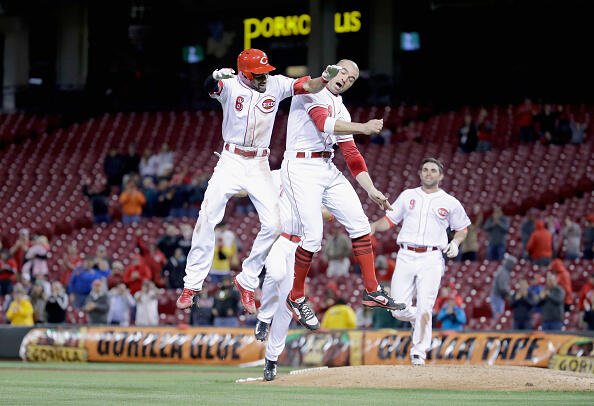 CINCINNATI, OH - MAY 01:  Billy Hamilton #6 and Joey Votto #19 of the Cincinnati Reds celebrate after Hamilton hit a game winning double in the10th inning against the Pittsburgh Pirates at Great American Ball Park on May 1, 2017 in Cincinnati, Ohio.  (Photo by Andy Lyons/Getty Images)