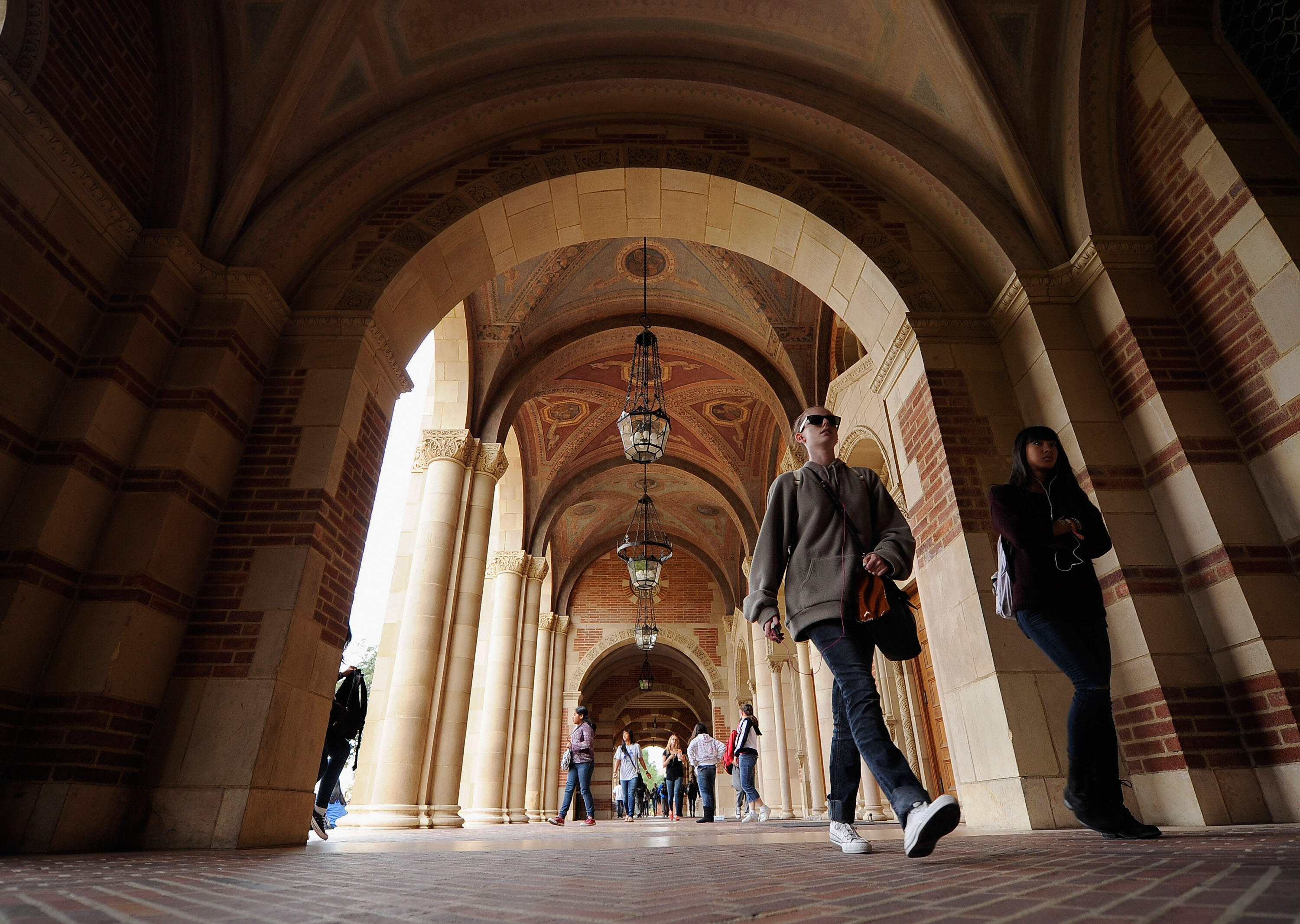 LOS ANGELES, CA - APRIL 23:  Students walk near Royce Hall on the campus of UCLA on April 23, 2012 in Los Angeles, California. According to reports, half of recent college graduates with bachelor's degrees are finding themselves underemployed or jobless. 