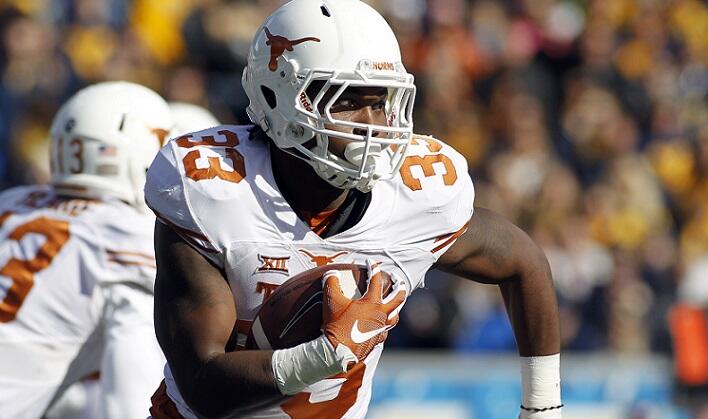 MORGANTOWN, WV - NOVEMBER 14:  D'Onta Foreman #33 of the Texas Longhorns rushes in the first half against the West Virginia Mountaineers during the game on November 14, 2015 at Mountaineer Field in Morgantown, West Virginia.  (Photo by Justin K. Aller/Get