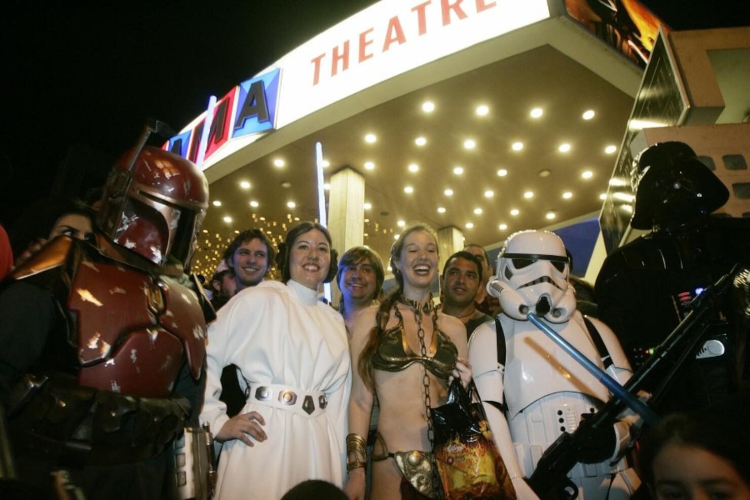 A group of people in costume pose for a