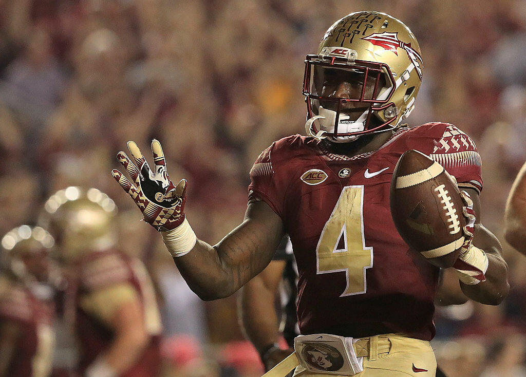 TALLAHASSEE, FL - OCTOBER 29:  Dalvin Cook #4 of the Florida State Seminoles celebrates a touchdown during a game against the Clemson Tigers at Doak Campbell Stadium on October 29, 2016 in Tallahassee, Florida.  (Photo by Mike Ehrmann/Getty Images)