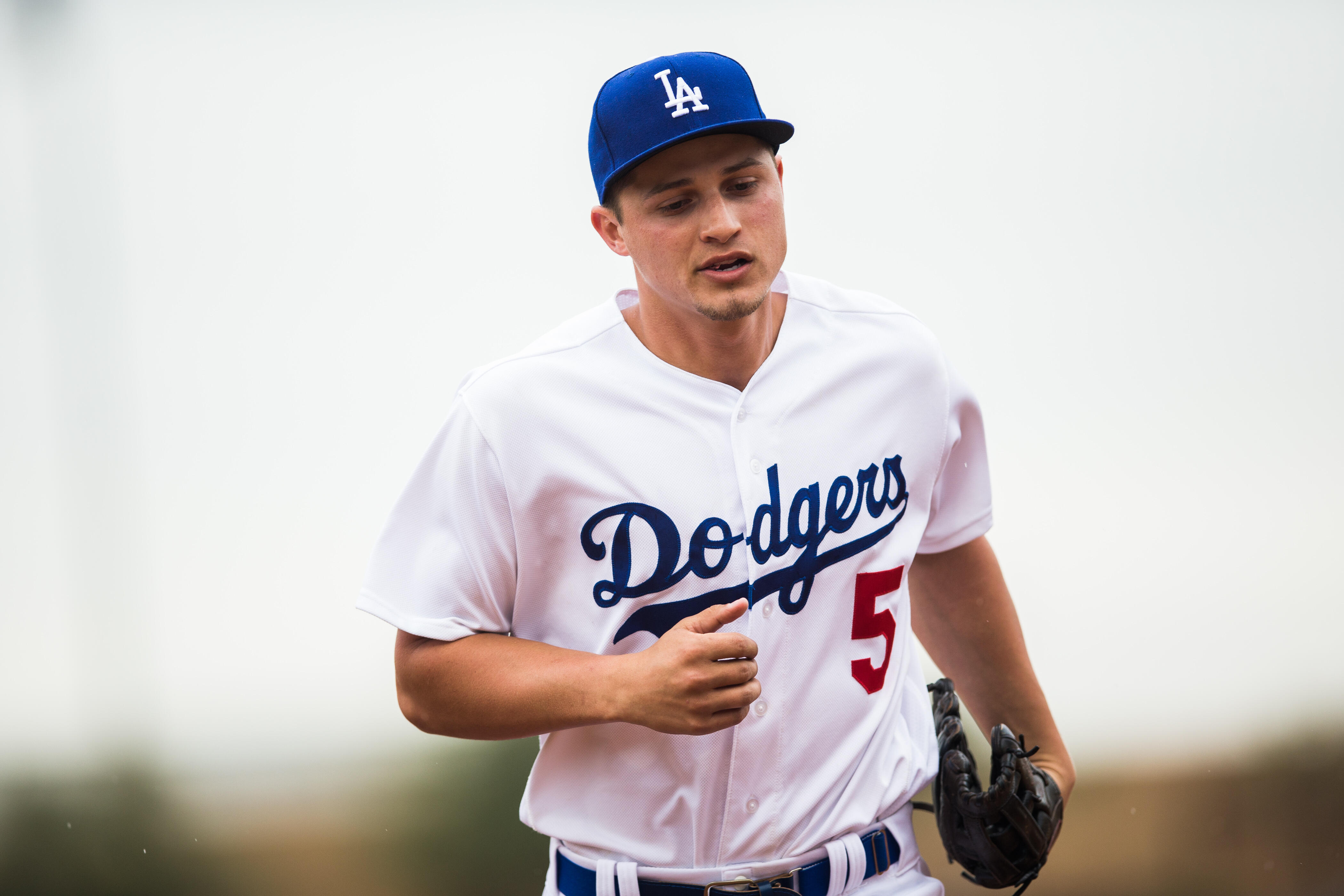 GLENDALE, AZ - FEBRUARY 27:  Corey Seager #5 of the Los Angeles Dodgers looks on during a spring training game against the Colorado Rockies at Camelback Ranch on February 27, 2017 in Glendale, Arizona. (Photo by Rob Tringali/Getty Images)