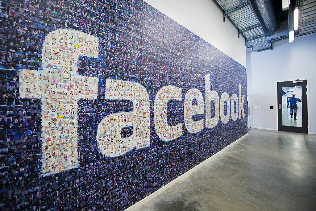A big logo created from pictures of Facebook users worldwide is pictured in the company's Data Center, its first outside the US on November 7, 2013 in Lulea, in Swedish Lapland. The company began construction on the facility in October 2011 and went live 