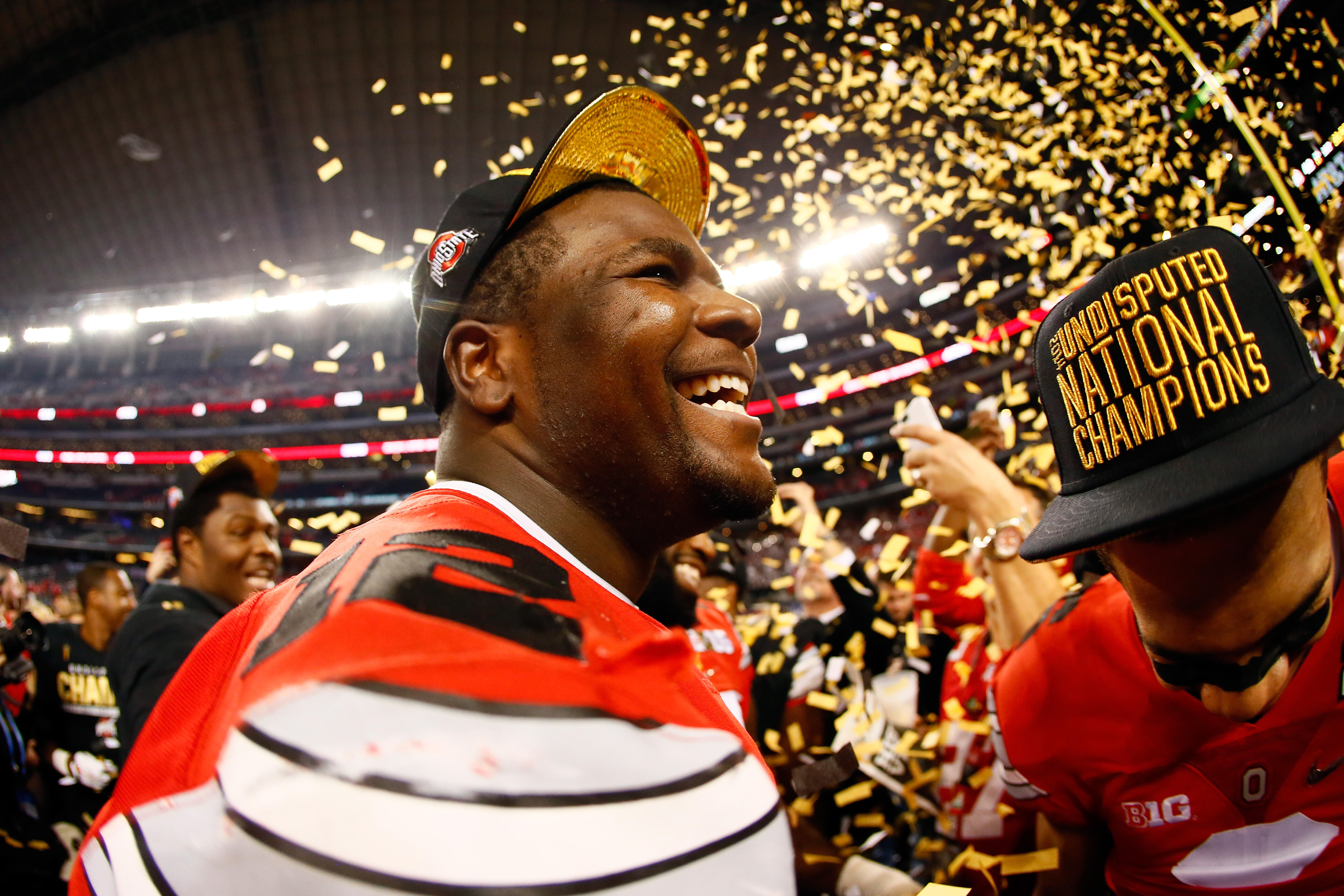 ARLINGTON, TX - JANUARY 12:  Quarterback Cardale Jones #12 of the Ohio State Buckeyes celebrates after defeating the Oregon Ducks 42 to 20 in the College Football Playoff National Championship Game at AT&T Stadium on January 12, 2015 in Arlington, Texas. 