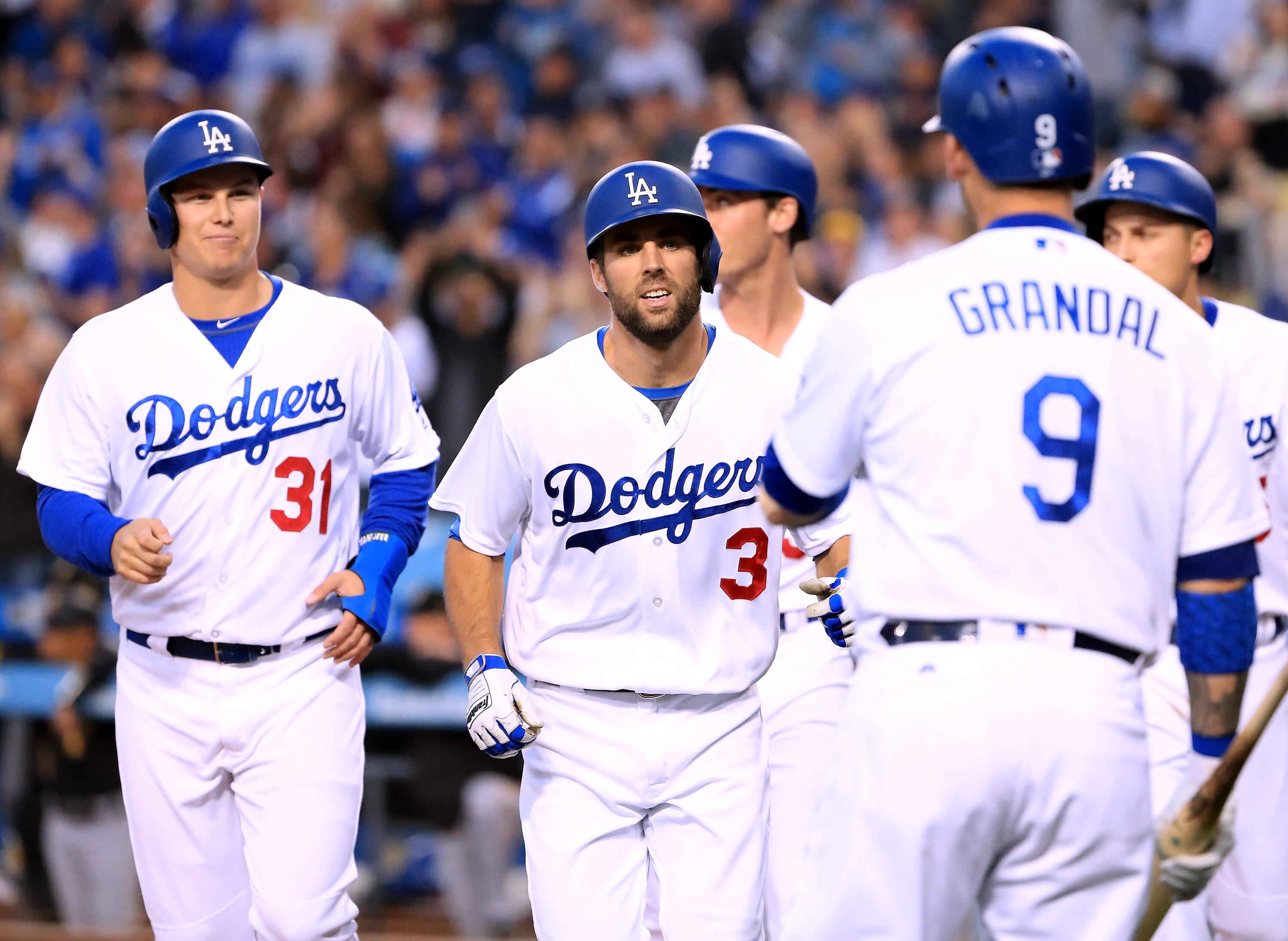 LOS ANGELES, CA - MAY 08:  Chris Taylor #3 of the Los Angeles Dodgers celebrates his grand slam homerun to take a 5-0 lead over the Pittsburgh Pirates during the first inning at Dodger Stadium on May 8, 2017 in Los Angeles, California.  (Photo by Harry Ho