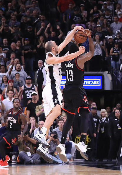 SAN ANTONIO, TX - MAY 09:  Manu Ginobili #20 of the San Antonio Spurs makes the block against the three-point attempt by James Harden #13 of the Houston Rockets in the final second of play in overtime during Game Five of the Western Conference Semi-Finals at AT&T Center on May 9, 2017 in San Antonio, Texas.  NOTE TO USER: User expressly acknowledges and agrees that, by downloading and or using this photograph, User is consenting to the terms and conditions of the Getty Images License Agreement.  (Photo by Ronald Martinez/Getty Images)