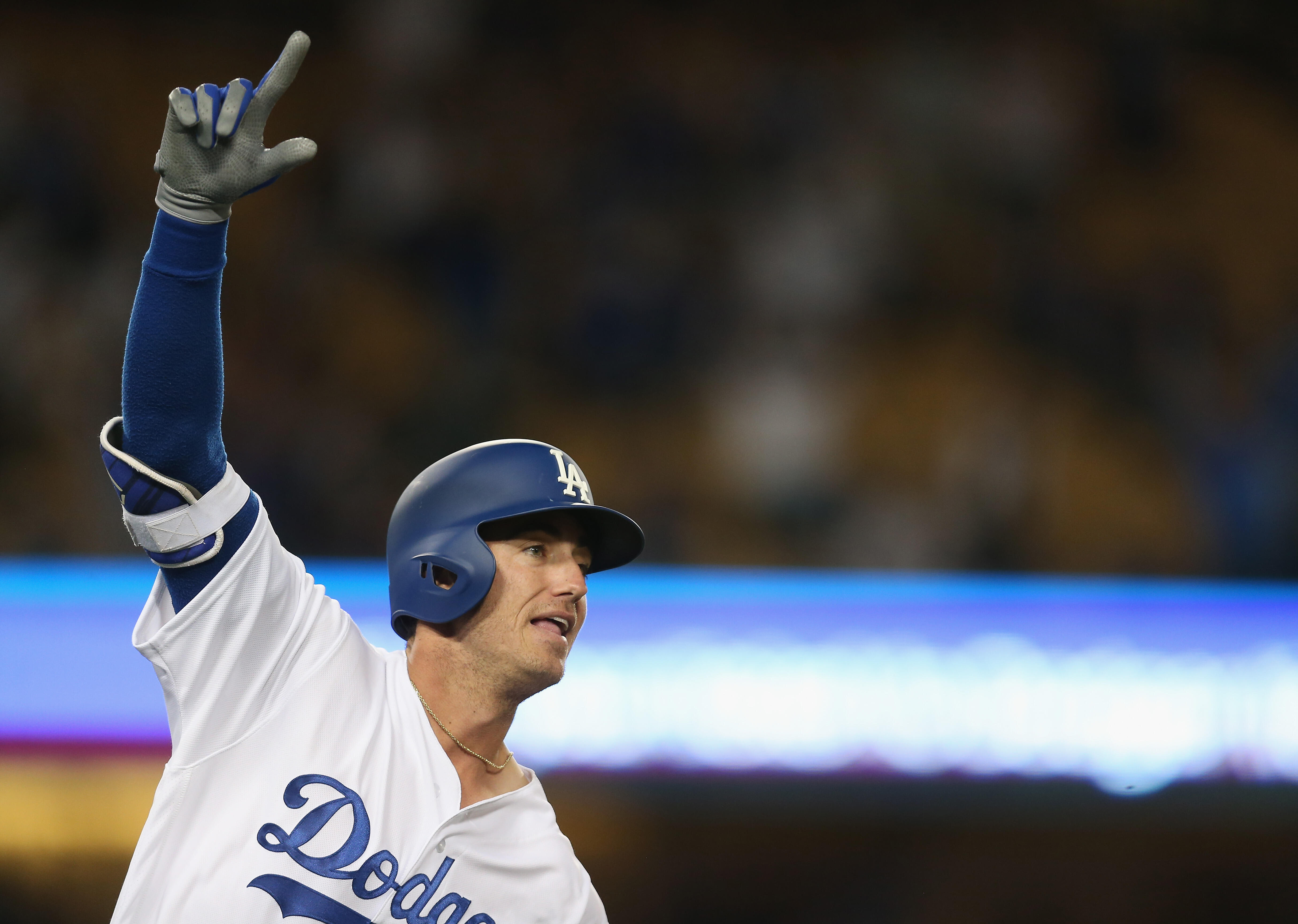 LOS ANGELES, CA - APRIL 29:  Cody Bellinger #35 of the Los Angeles Dodgers celebrates as he runs to first base after hitting a solo home run in the ningh inning against the Philadelphia Phillies at Dodger Stadium on April 29, 2017 in Los Angeles, Californ