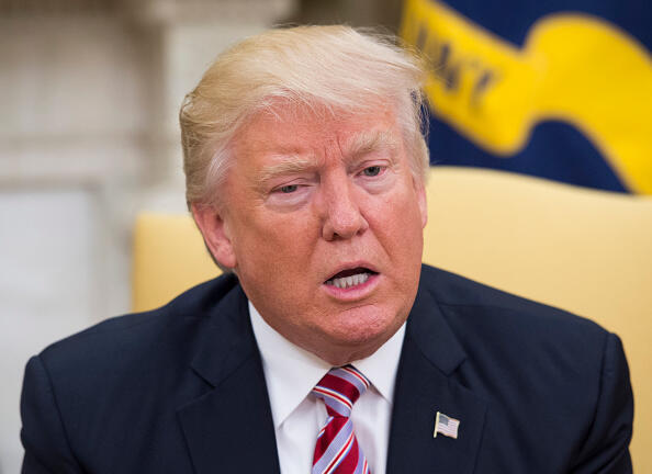 WASHINGTON, DC - MAY 10: (AFP-OUT) President Donald Trump meets with former Secretary of State Henry Kissinger in the Oval Office at the White House on May 10, 2017 in Washington, DC. (Photo by Molly Riley-Pool/Getty Images)