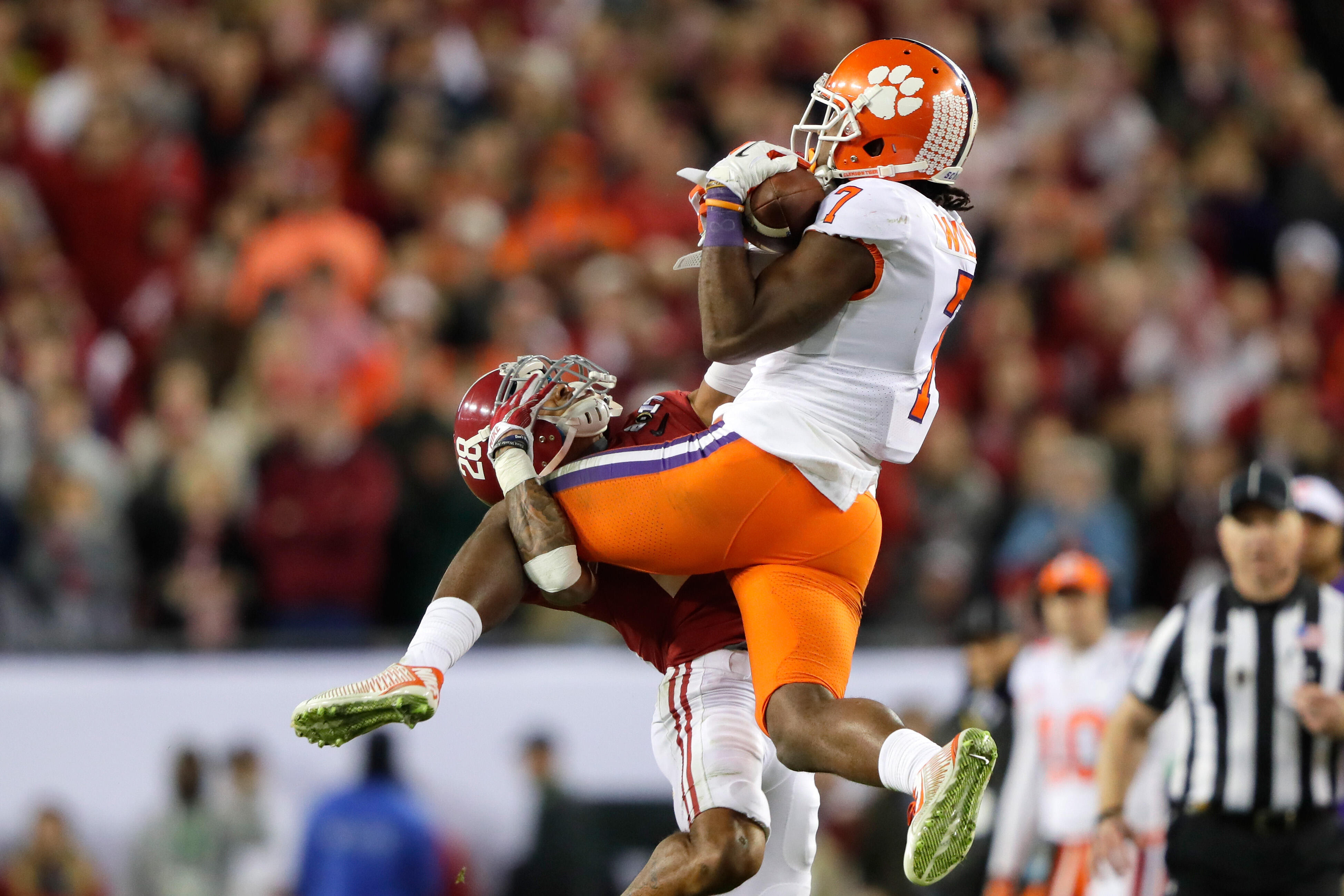 TAMPA, FL - JANUARY 09:  Wide receiver Mike Williams #7 of the Clemson Tigers makes a reception against defensive back Anthony Averett #28 of the Alabama Crimson Tide during the fourth quarter of the 2017 College Football Playoff National Championship Gam
