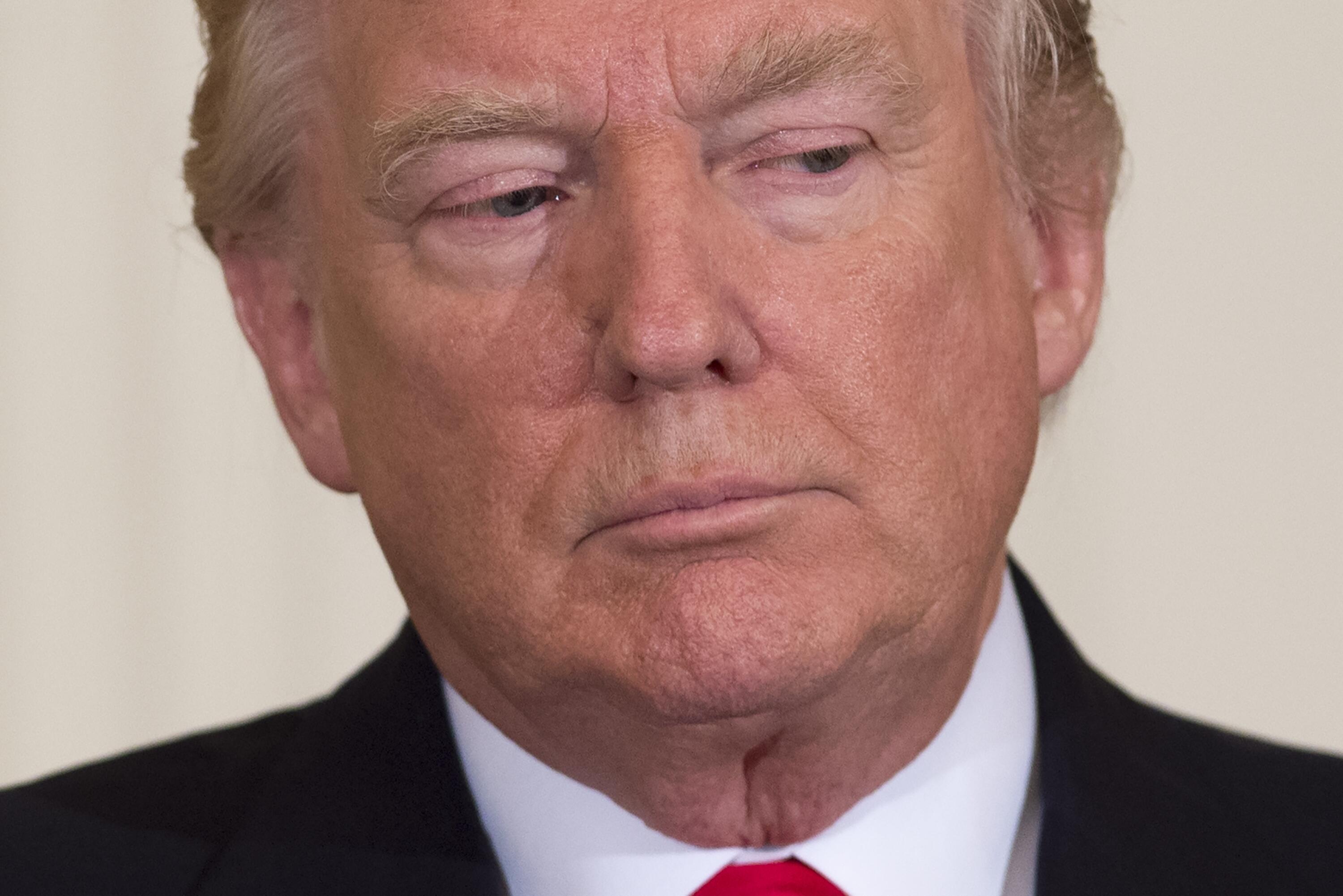 US President Donald Trump attends a Mother's Day event hosted by First Lady Melania Trump for military spouses in the East Room of the White House in Washington, DC, May 12, 2017. / AFP PHOTO / SAUL LOEB        (Photo credit should read SAUL LOEB/AFP/Gett