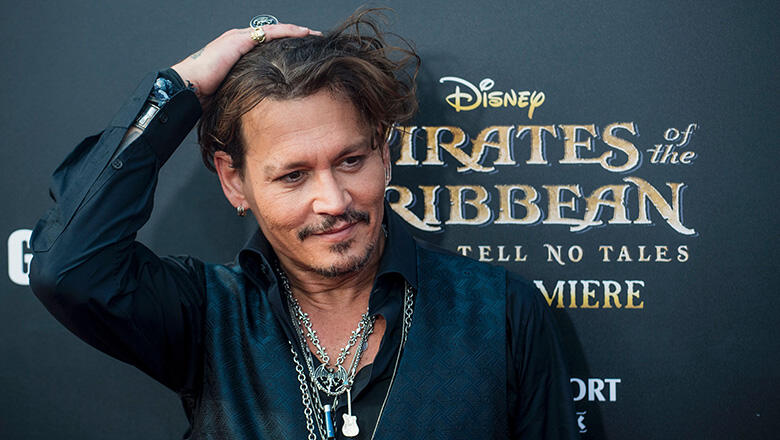 Actor Johnny Depp arrives for the world premiere of Disney movie 