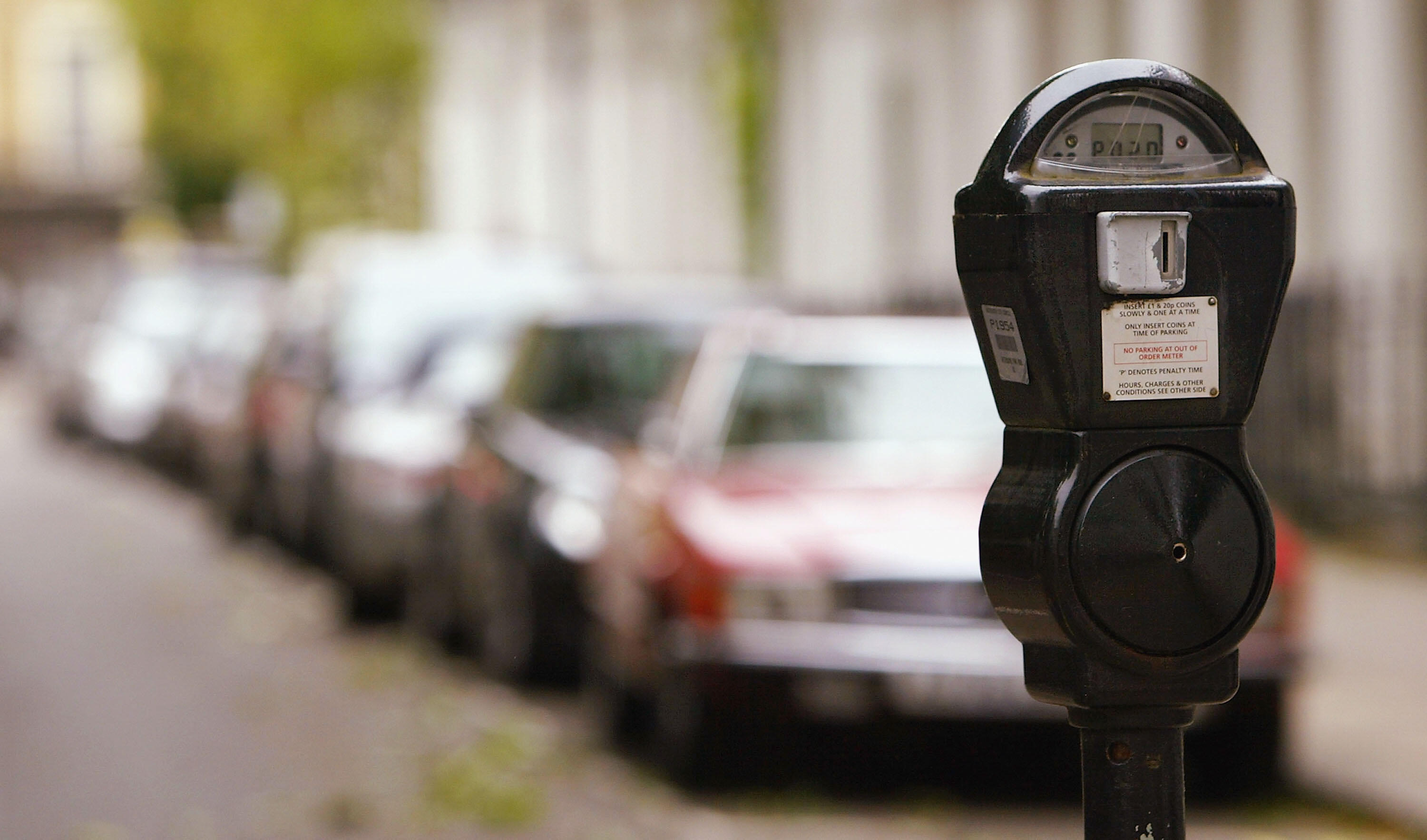 LONDON - JULY 7:  A parking meter is seen on a London street, July 7, 2004 in London, England. Money raised in England by parking fines, meters, residential parking schemes and fixed penalty notices has reached almost 1 billion GBP a year, with London mot