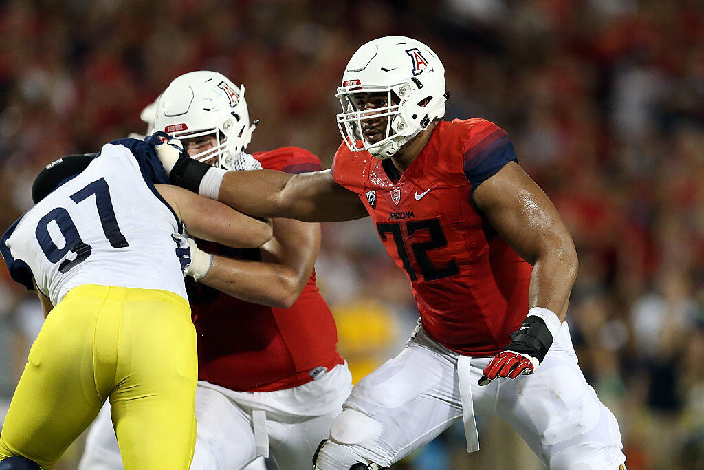 TUCSON, AZ - SEPTEMBER 19: Offensive lineman Freddie Tagaloa #72 of the Arizona Wildcats blocks defensive lineman Neal Murphy #97 of the Northern Arizona Lumberjacks during the first half of the college football game  at Arizona Stadium on September 19, 2015 in Tucson, Arizona. (Photo by Chris Coduto/Getty Images)