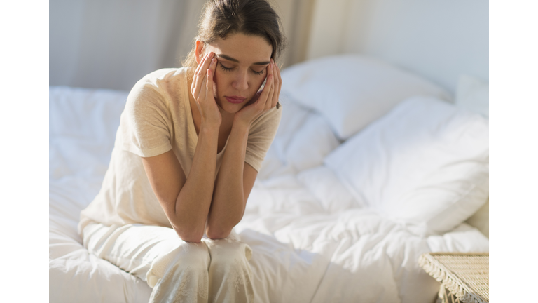 Young woman with a headache