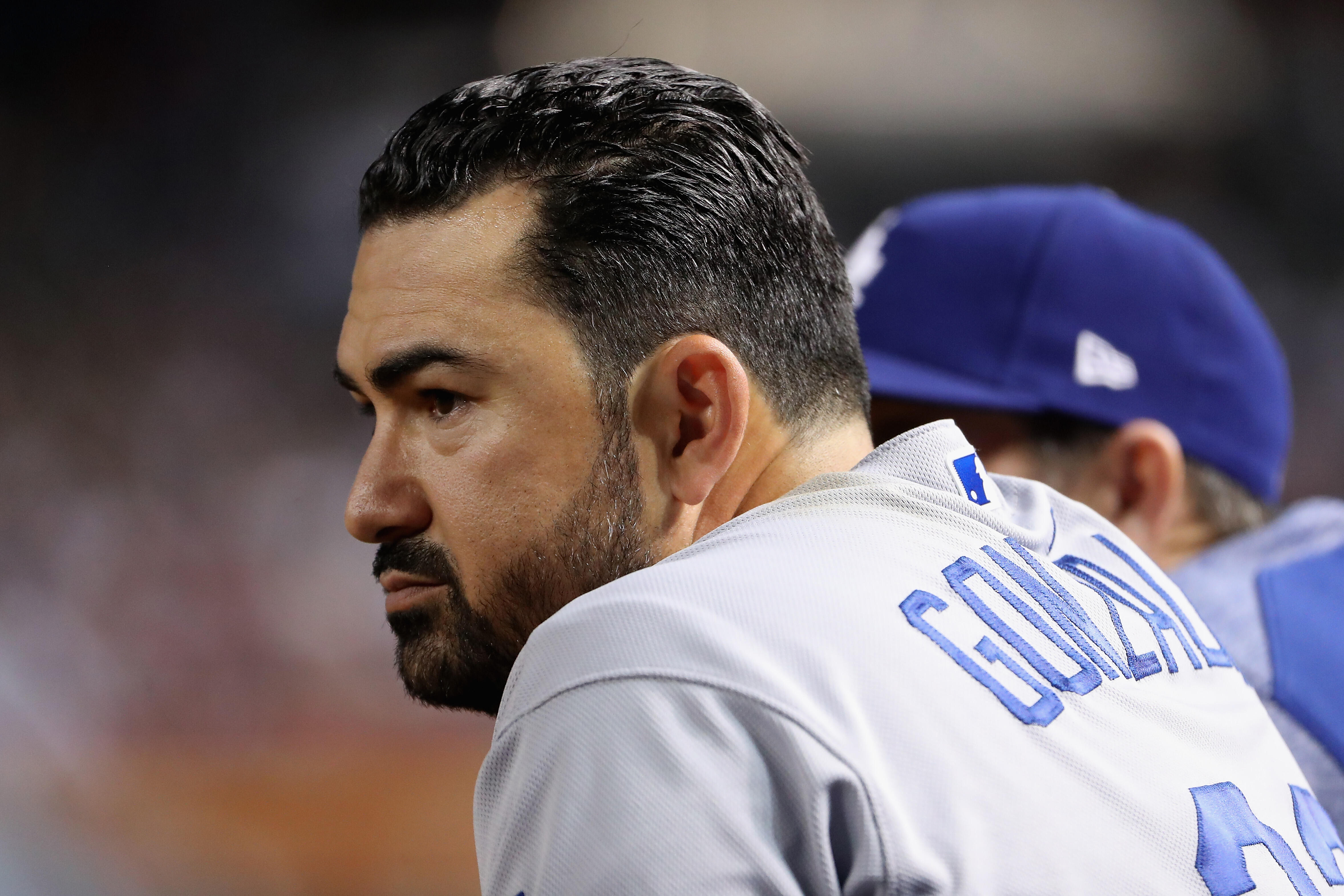 PHOENIX, AZ - APRIL 21:  Adrian Gonzalez #23 of the Los Angeles Dodgers watches from the dugout during the MLB game against the Arizona Diamondbacks at Chase Field on April 21, 2017 in Phoenix, Arizona.  (Photo by Christian Petersen/Getty Images)