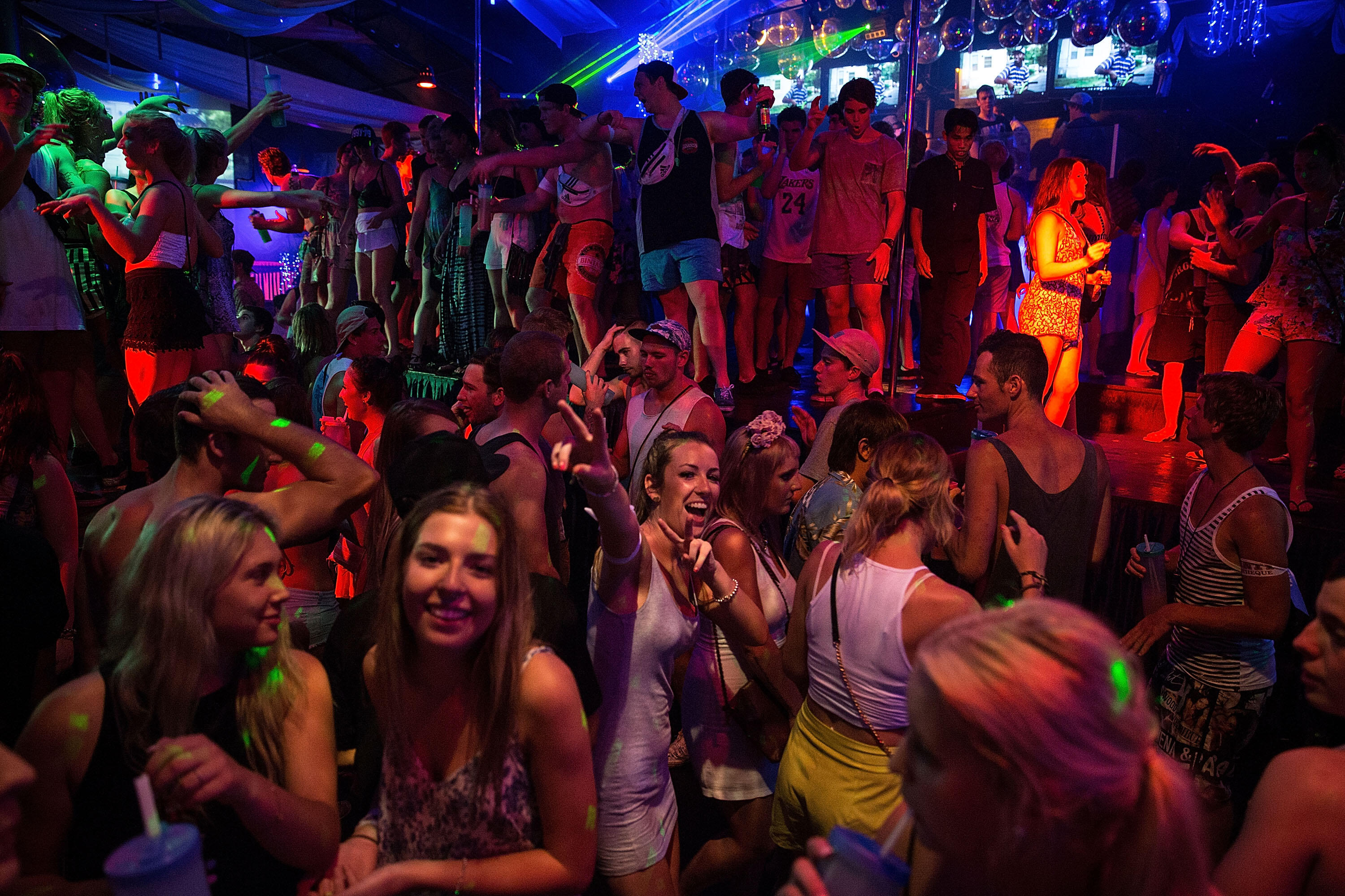 KUTA, INDONESIA - NOVEMBER 25:  Teenagers attend a party in a nightclub during Australian 