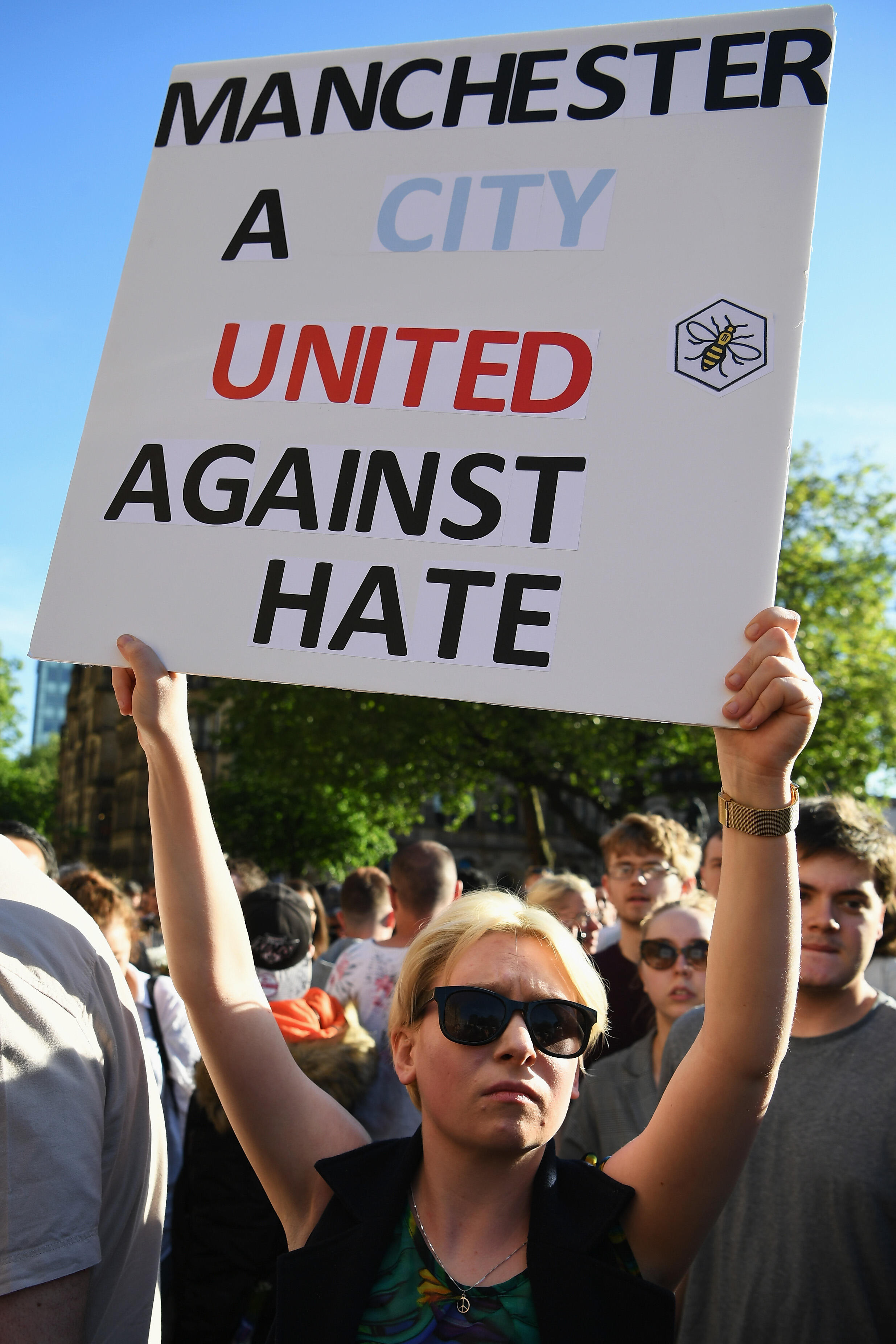 MANCHESTER, ENGLAND - MAY 23:  Members of the public gather at a vigil, to honour the victims of Monday evening's terror attack, at Albert Square on May 23, 2017 in Manchester, England. Monday's explosion occurred at Manchester Arena as concert goers were