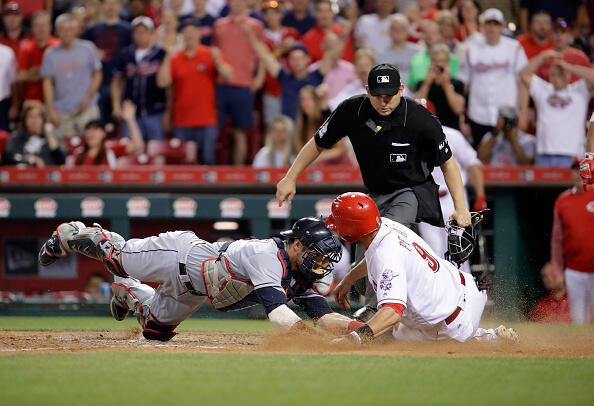 CINCINNATI, OH - MAY 23:  Yan Gomes #9 of the Cleveland Indians tags out Jose Peraza #9 of the Cincinnati Reds at home plate in the eigth inning at Great American Ball Park on May 23, 2017 in Cincinnati, Ohio.  (Photo by Andy Lyons/Getty Images)