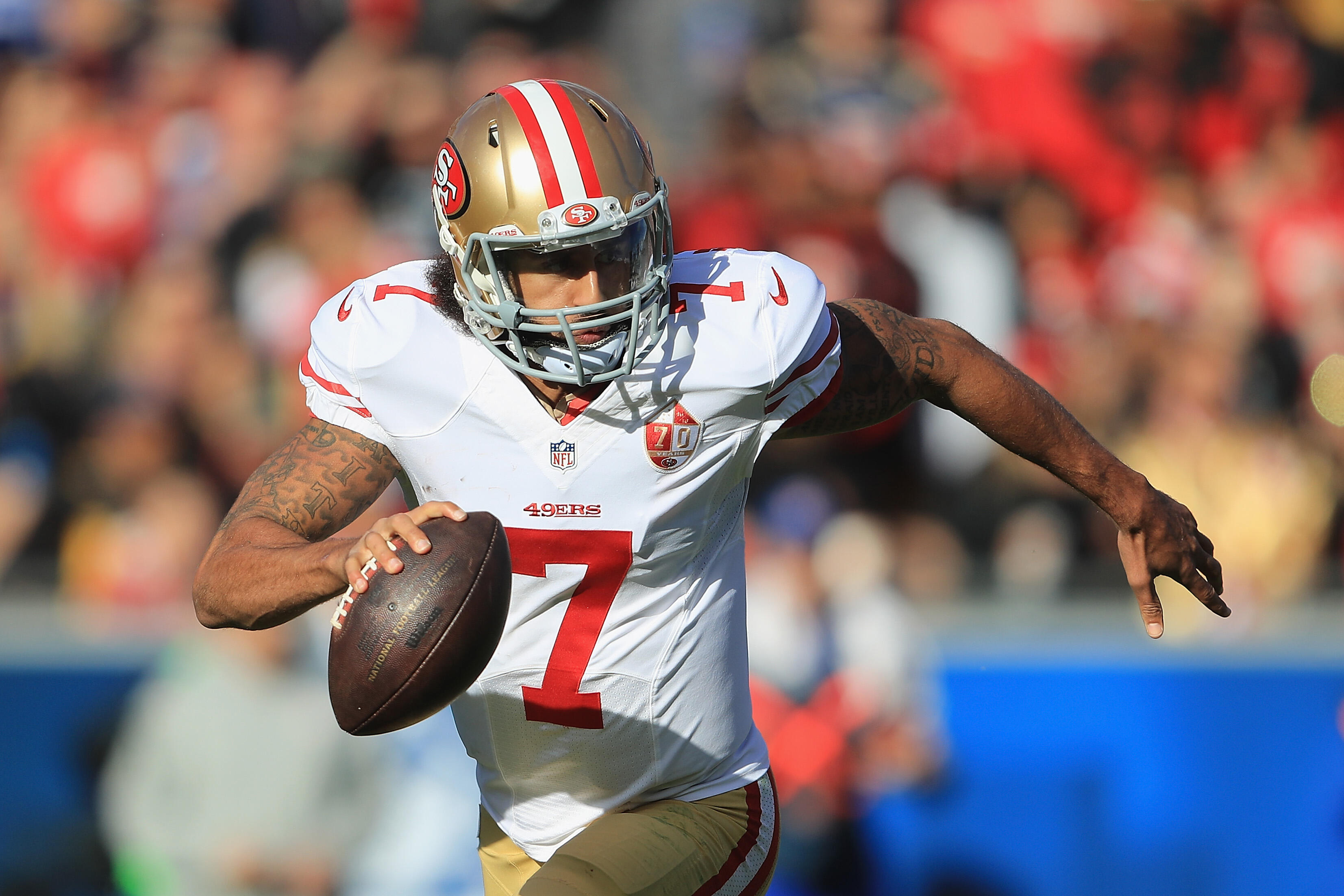 LOS ANGELES, CA - DECEMBER 24:  Colin Kaepernick #7 of the San Francisco 49ers runs with the ball during the game against the Los Angeles Rams at Los Angeles Memorial Coliseum on December 24, 2016 in Los Angeles, California.  (Photo by Sean M. Haffey/Gett