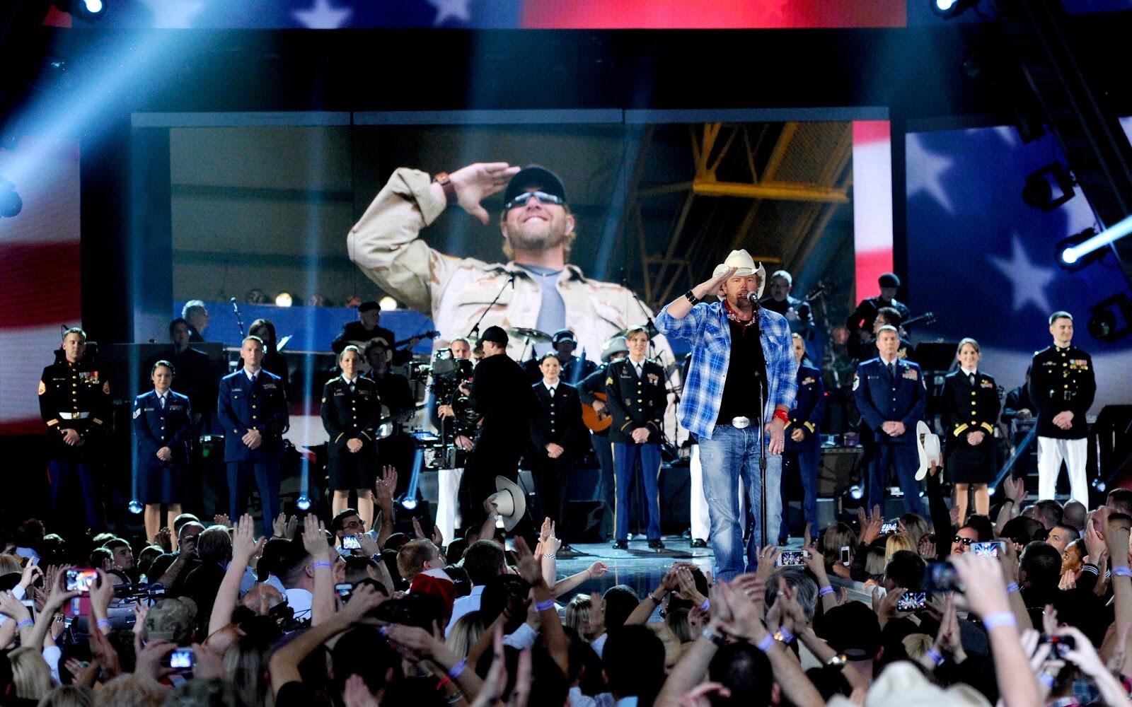 LAS VEGAS, NV - APRIL 07:  Recording artist Toby Keith performs onstage during ACM Presents: An All-Star Salute To The Troops at the MGM Grand Garden Arena on April 7, 2014 in Las Vegas, Nevada.  (Photo by Ethan Miller/Getty Images for ACM)
