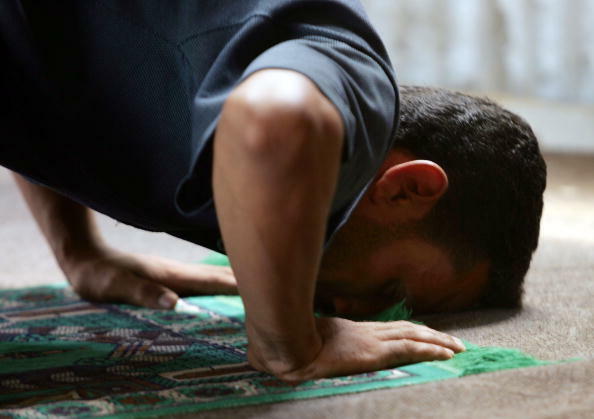 GAZA CITY, GAZA - AUGUST 8:  A Palestinian from a small farming community prays in the local mosque August 8, 2005 in the north Gaza Strip. Israel, which is set to begin the pullout of all 21 Gaza settlements and four more in the West Bank next week, has 