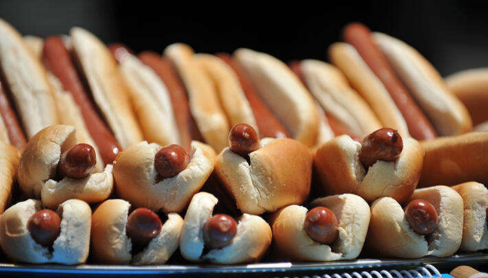 Hot dogs in buns at the official weigh-in ceremony for the Nathan’s Famous Fourth of July International Hot Dog Eating Contest July 3, 2012 at City Hall in New York. The contest will be held July 4 at Nathan's Famous in Coney Island. AFP PHOTO/Stan HOND