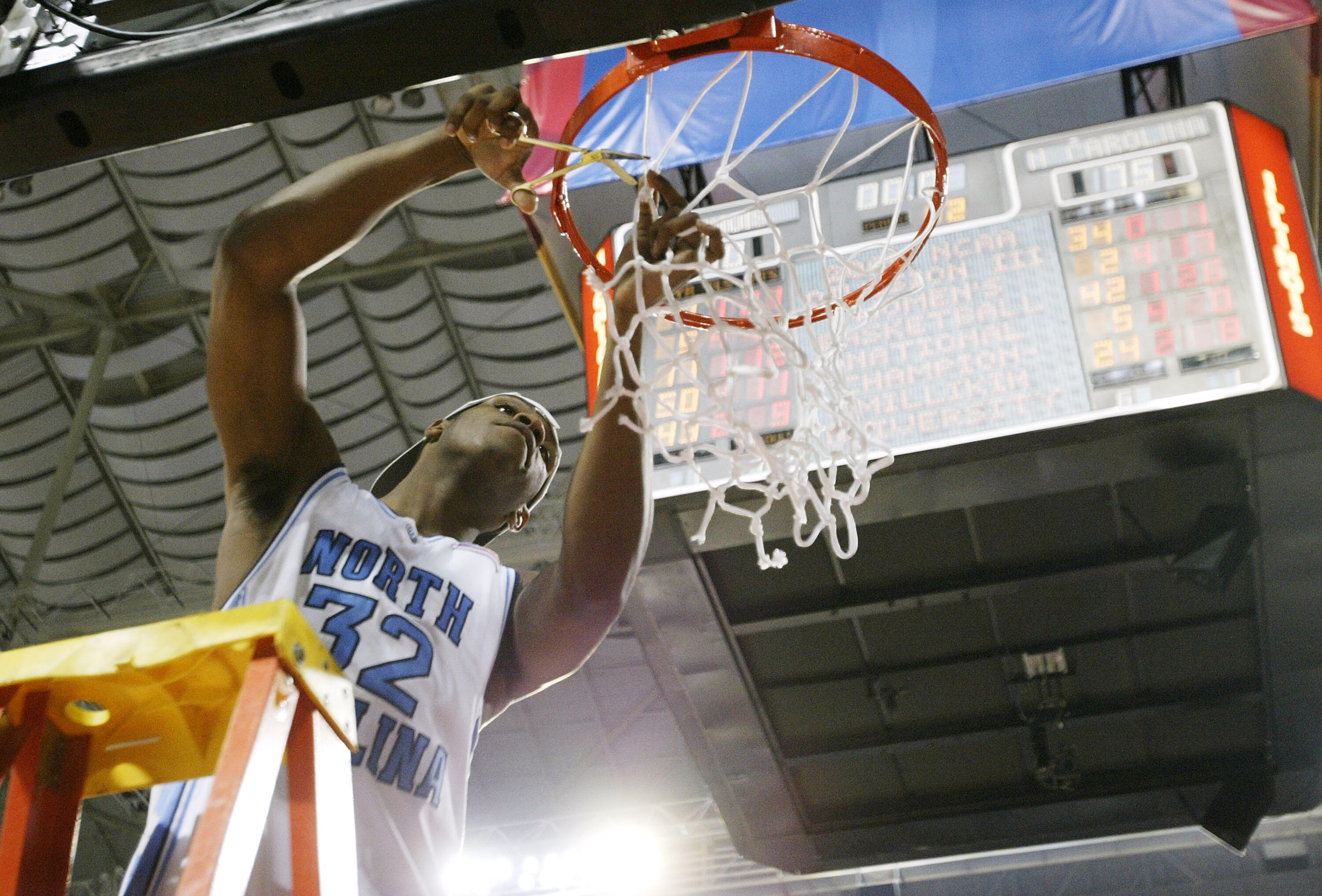 ST. LOUIS - APRIL 04:  Rashad McCants #32 of the North Carolina Tar Heels celebrates by cutting down the nets after defeating the Illinois Fighting Illini 75-70 to win the NCAA Men's National Championship game at the Edward Jones Dome on April 4, 2005 in 