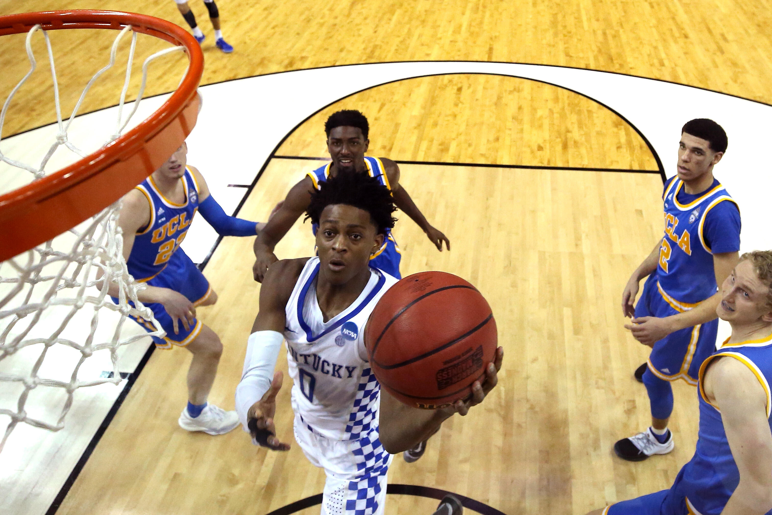 MEMPHIS, TN - MARCH 24: De'Aaron Fox #0 of the Kentucky Wildcats drives to the basket against the UCLA Bruins in the second half during the 2017 NCAA Men's Basketball Tournament South Regional at FedExForum on March 24, 2017 in Memphis, Tennessee.  (Photo