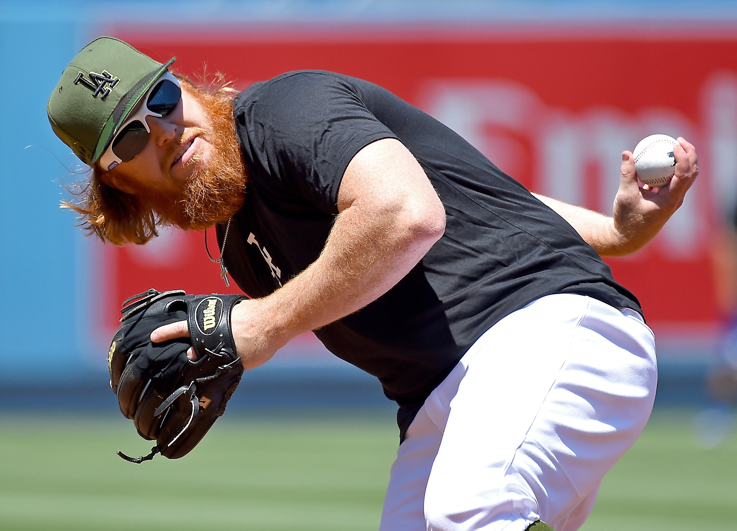 LOS ANGELES, CA - MAY 27:  Justin Turner #10 of the Los Angeles Dodgers takes ground balls at third base before the game against the Chicago Cubs at Dodger Stadium on May 27, 2017 in Los Angeles, California.  (Photo by Jayne Kamin-Oncea/Getty Images)