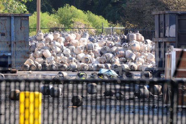 TAVARES, FL - JULY 30:  Propane cylinders lie on the grounds of Blue Rhino, a propane gas company, after a series of explosions rocked the central Florida propane gas plant, on July 30, 2013 in Tavares, Florida. The explosions occurred late last night, in