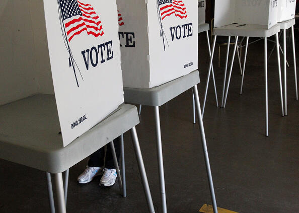 A voter casts their ballot at a polling station in the Summit Christian Fellowship in Big Bear, California, November 8, 2016. / AFP / Bill Wechter        (Photo credit should read BILL WECHTER/AFP/Getty Images)