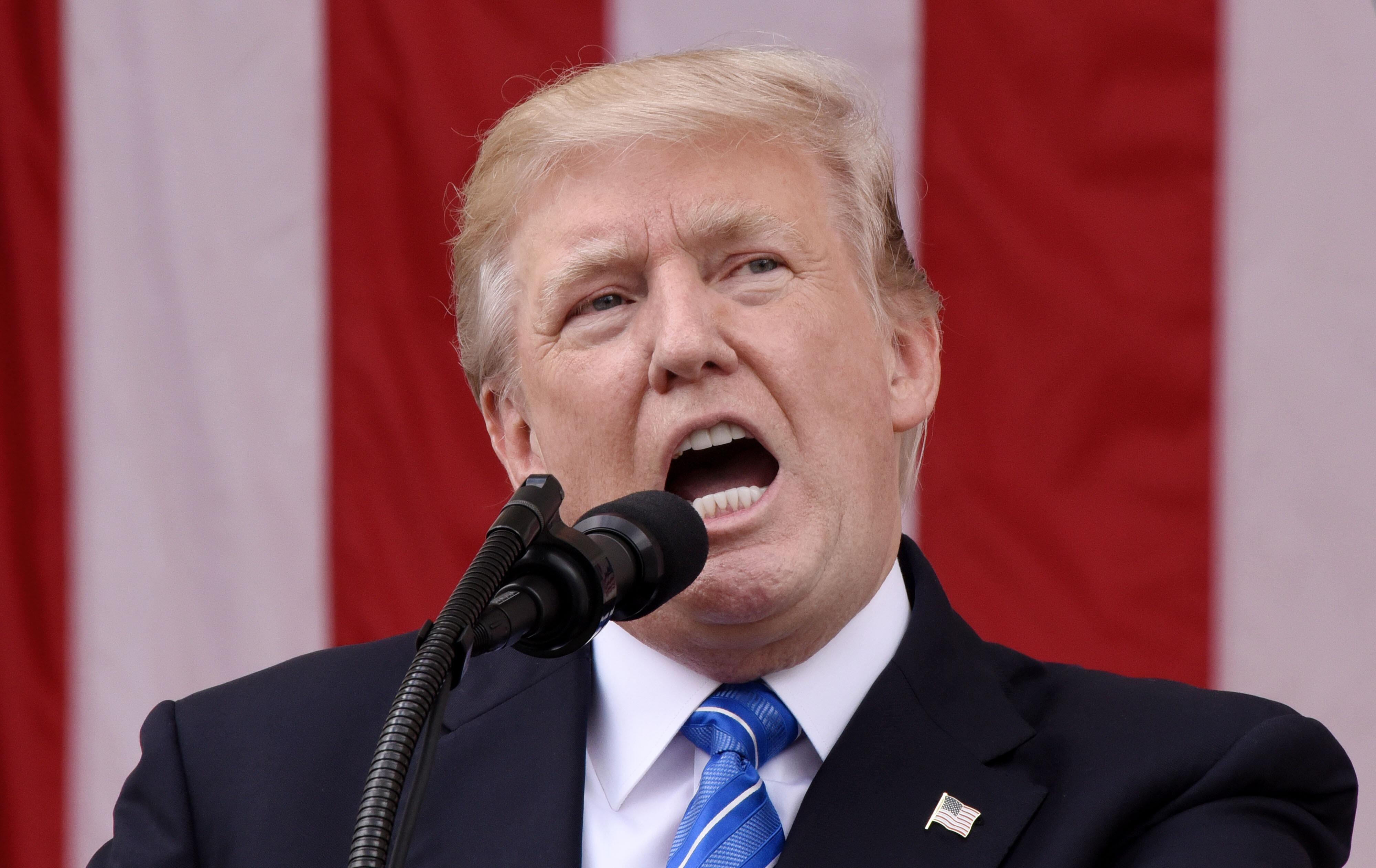 ARLINGTON, VA - MAY 29: President Donald Trump speaks at a wreath-laying ceremony at the Tomb of the Unknown Soldier at Arlington National Cemetery on Memorial Day, May 29, 2017 in Arlington, Virginia. (Photo by Olivier Douliery - Pool/Getty Images)