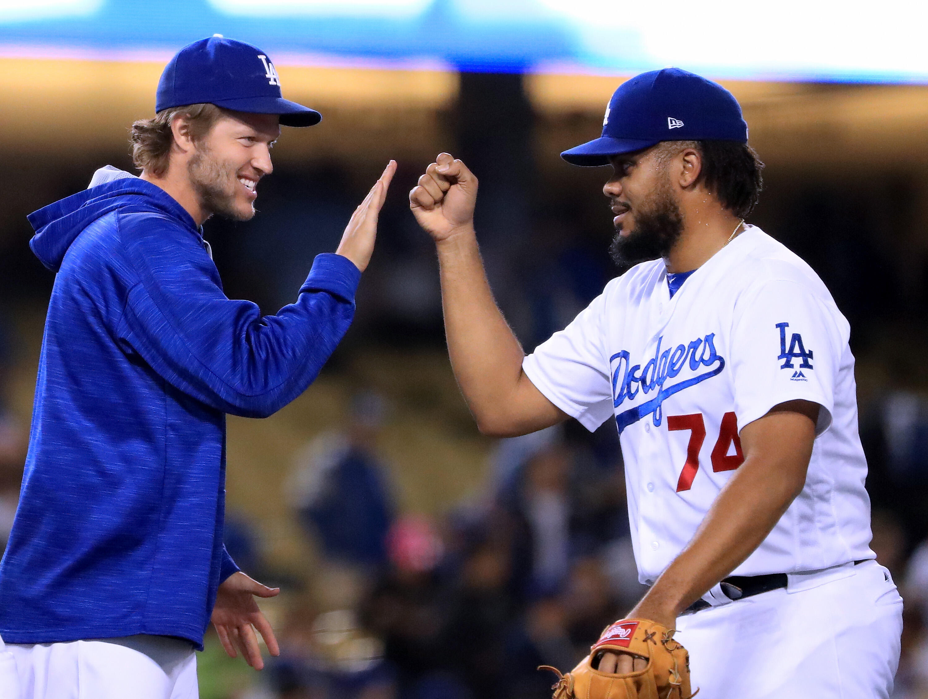 LOS ANGELES, CA - MAY 18:  Kenley Jansen #74 of the Los Angeles Dodgers celebrates a save and a 7-2 win over the Miami Marlins with Clayton Kershaw #22 at Dodger Stadium on May 18, 2017 in Los Angeles, California.  (Photo by Harry How/Getty Images)
