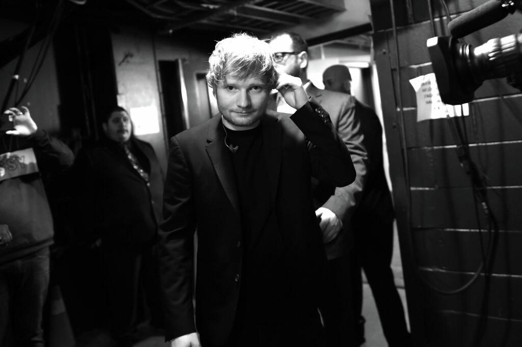 INGLEWOOD, CA - MARCH 05:  (EDITOR'S NOTE: Image was shot in black and white.)  Musician Ed Sheeran backstage at the 2017 iHeartRadio Music Awards which broadcast live on Turner's TBS, TNT, and truTV at The Forum on March 5, 2017 in Inglewood, California.  (Photo by Charley Gallay/Getty Images for iHeartMedia)