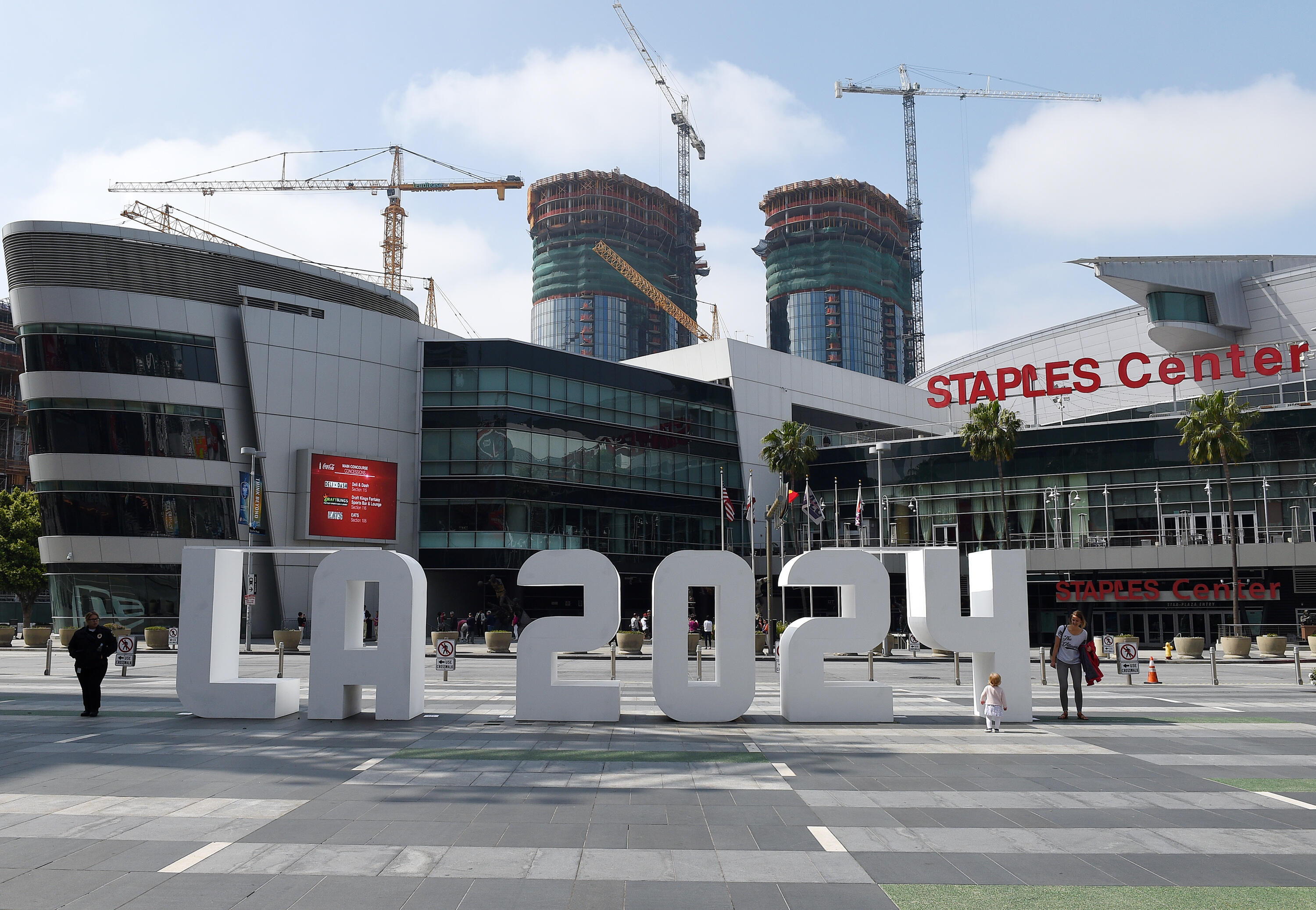 LOS ANGELES, CA - MAY 12: An LA 2024 sign is placed at LA Live in front of Staples Center as the International Olympic Committee Evaluation Commission continues its tour of proposed venues by LA 2024 bidding committee for the Los Angeles 2024 Summer Olymp