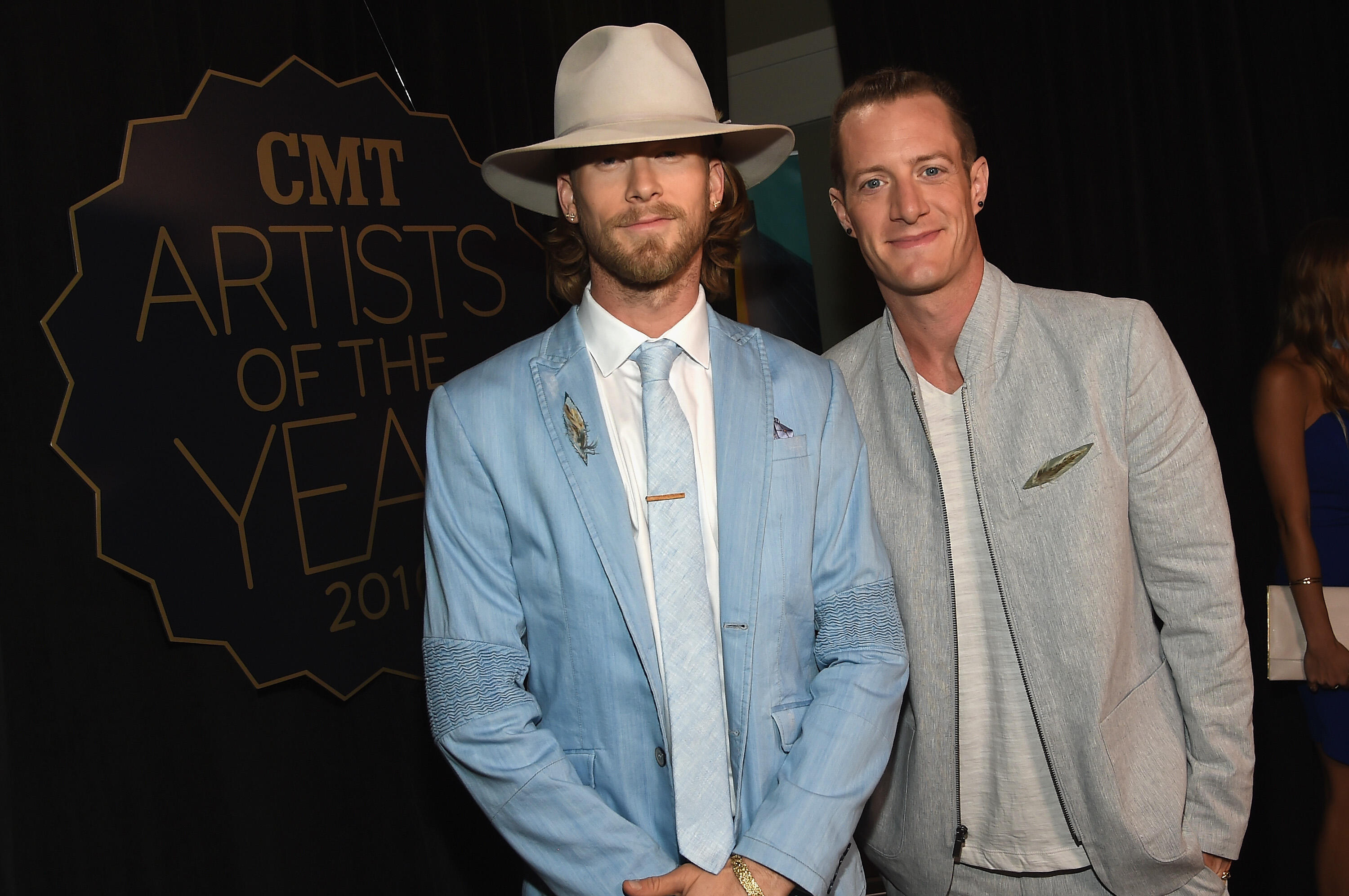 NASHVILLE, TN - OCTOBER 19:  Brian Kelley (L) and Tyler Hubbard (R) of Florida Georgia Line arrive on the red carpet at CMT Artists of the Year 2016 on October 19, 2016 in Nashville, Tennessee.  (Photo by Rick Diamond/Getty Images for CMT)