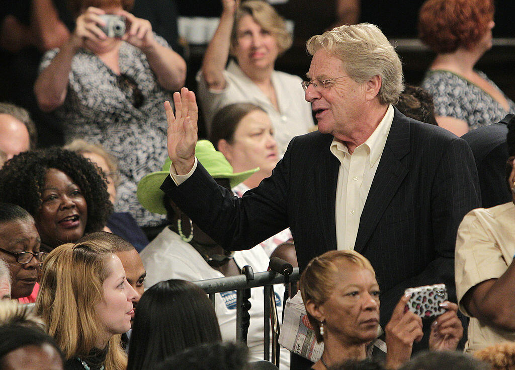 CINCINNATI, OH - JULY 16:  Former Cincinnati mayor and talk show host Jerry Springer waves to people in the crowd as he sits down before the start of a campaign event where U.S. President Barack Obama spoke about the economy July 16, 2012 in Cincinnati, O