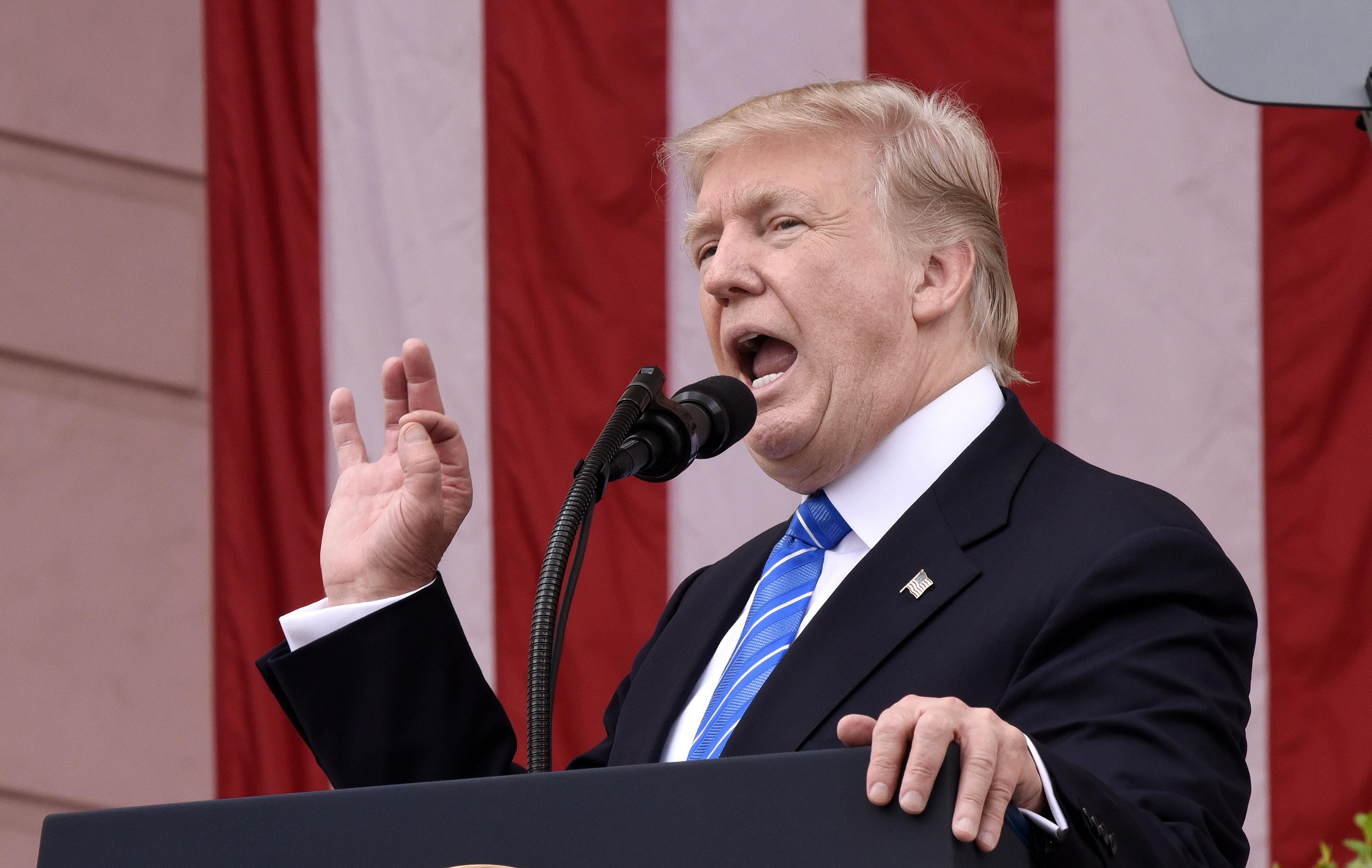 ARLINGTON, VA - MAY 29: President Donald Trump speaks at a wreath-laying ceremony at the Tomb of the Unknown Soldier at Arlington National Cemetery on Memorial Day, May 29, 2017 in Arlington, Virginia. (Photo by Olivier Douliery - Pool/Getty Images)